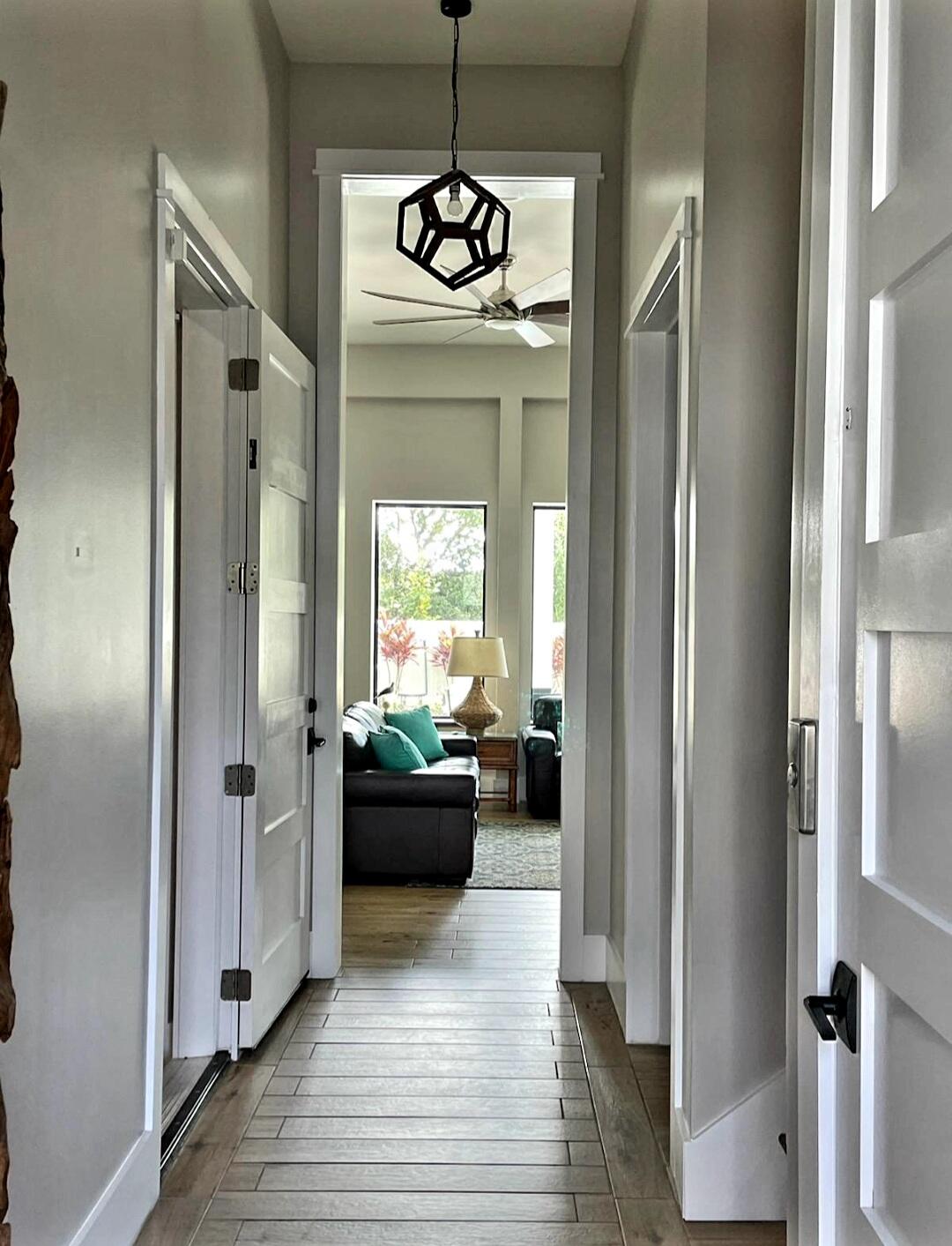 10 Walton Drive Miramar Beach, FL 32550 - Photo 5 of 80 a view of a hallway view with wooden floor and furniture