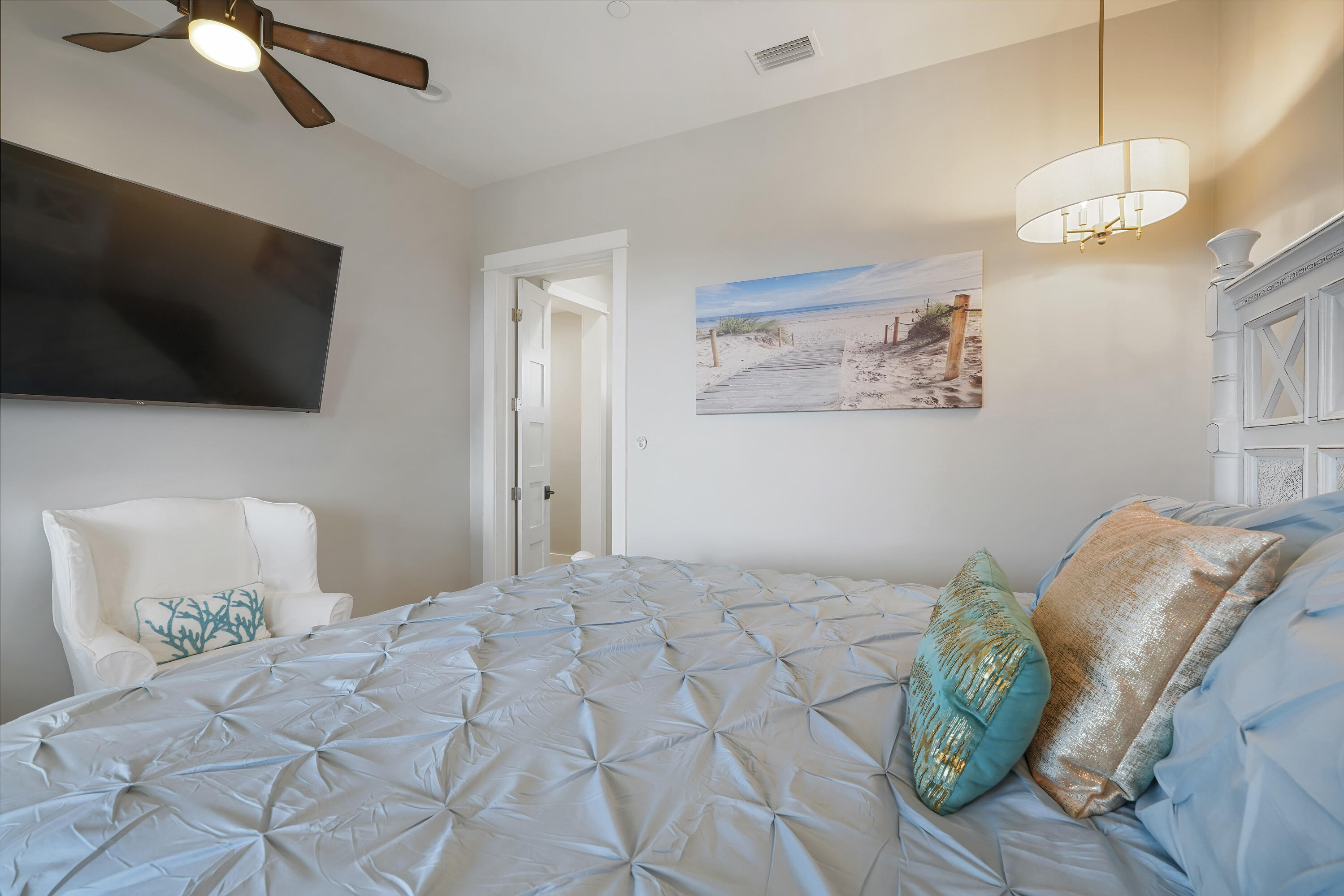 10 Walton Drive Miramar Beach, FL 32550 - Photo 61 of 80 a bedroom with a bed and a flat screen tv