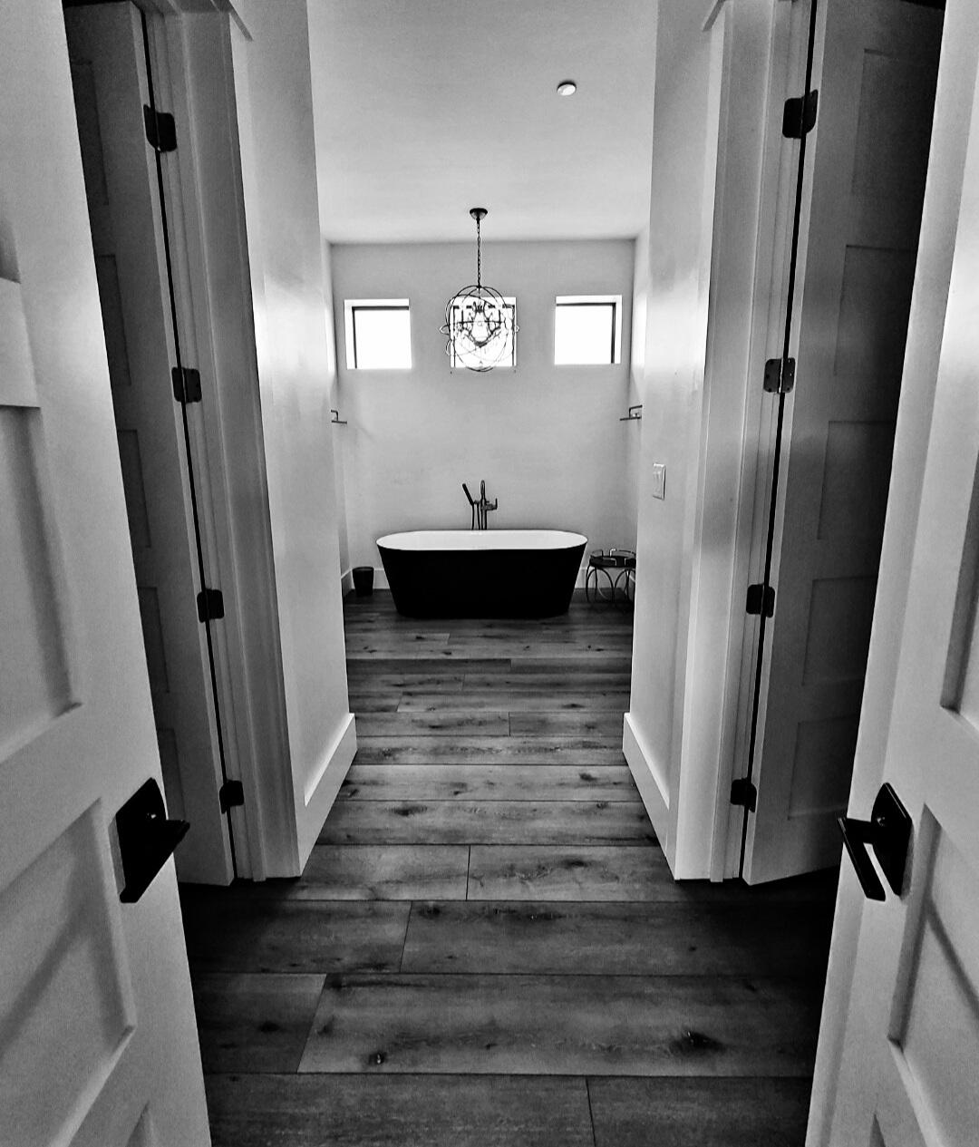 10 Walton Drive Miramar Beach, FL 32550 - Photo 64 of 80 a view of a hallway with wooden floor and staircase