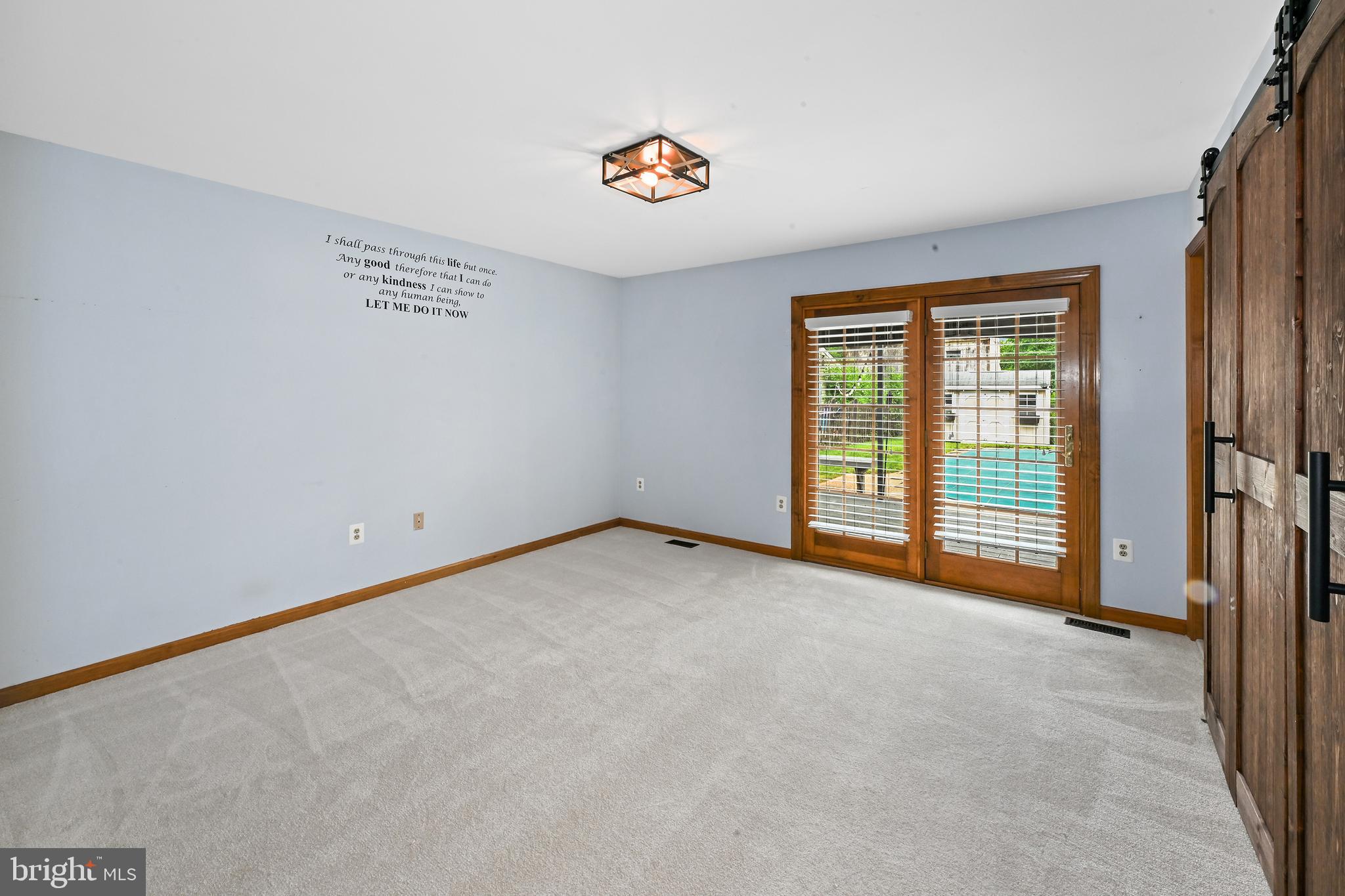 10303 Abbott Road Manassas, VA 20110 - Photo 16 of 36 a view of an empty room with a window