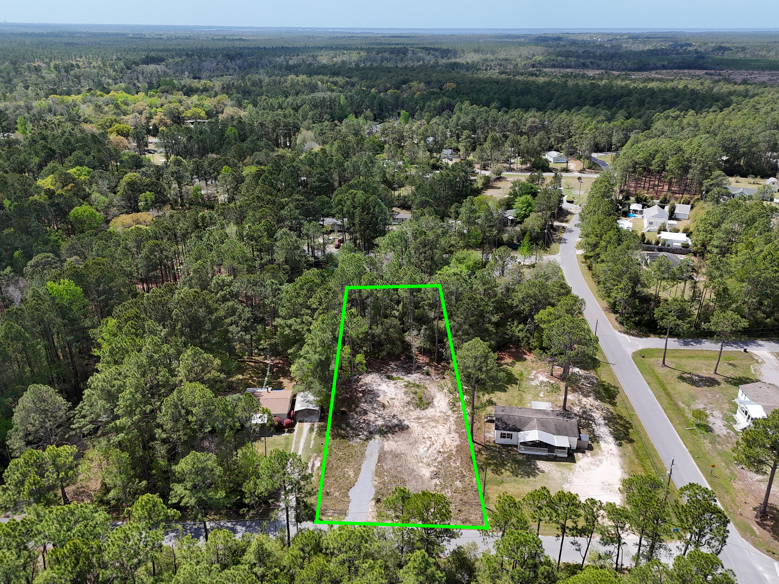 164 Memorial Lane Freeport, FL 32439 - Photo 1 of 11 an aerial view of multiple house