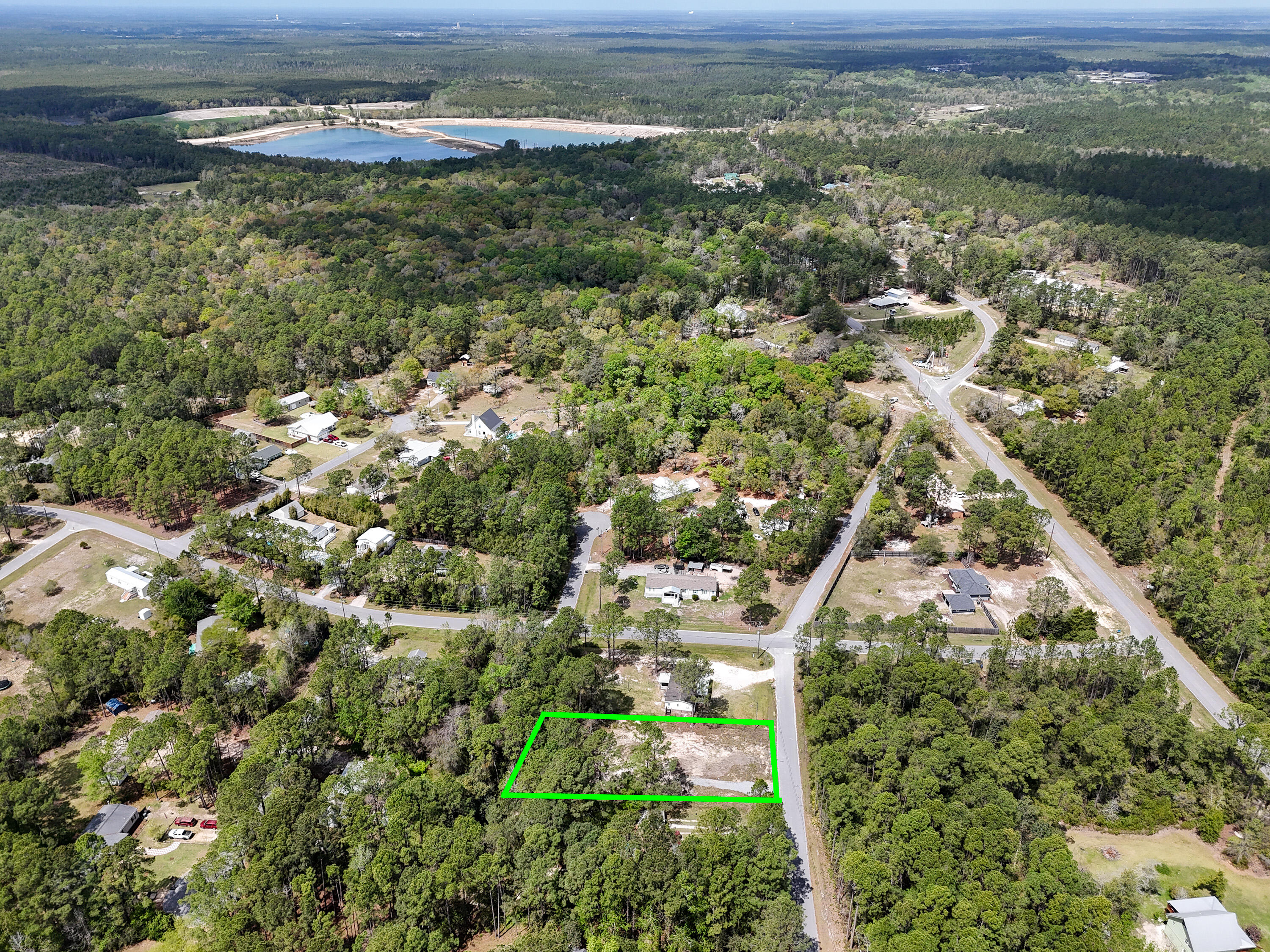 164 Memorial Lane Freeport, FL 32439 - Photo 7 of 11 a view of a yard with an outdoor space
