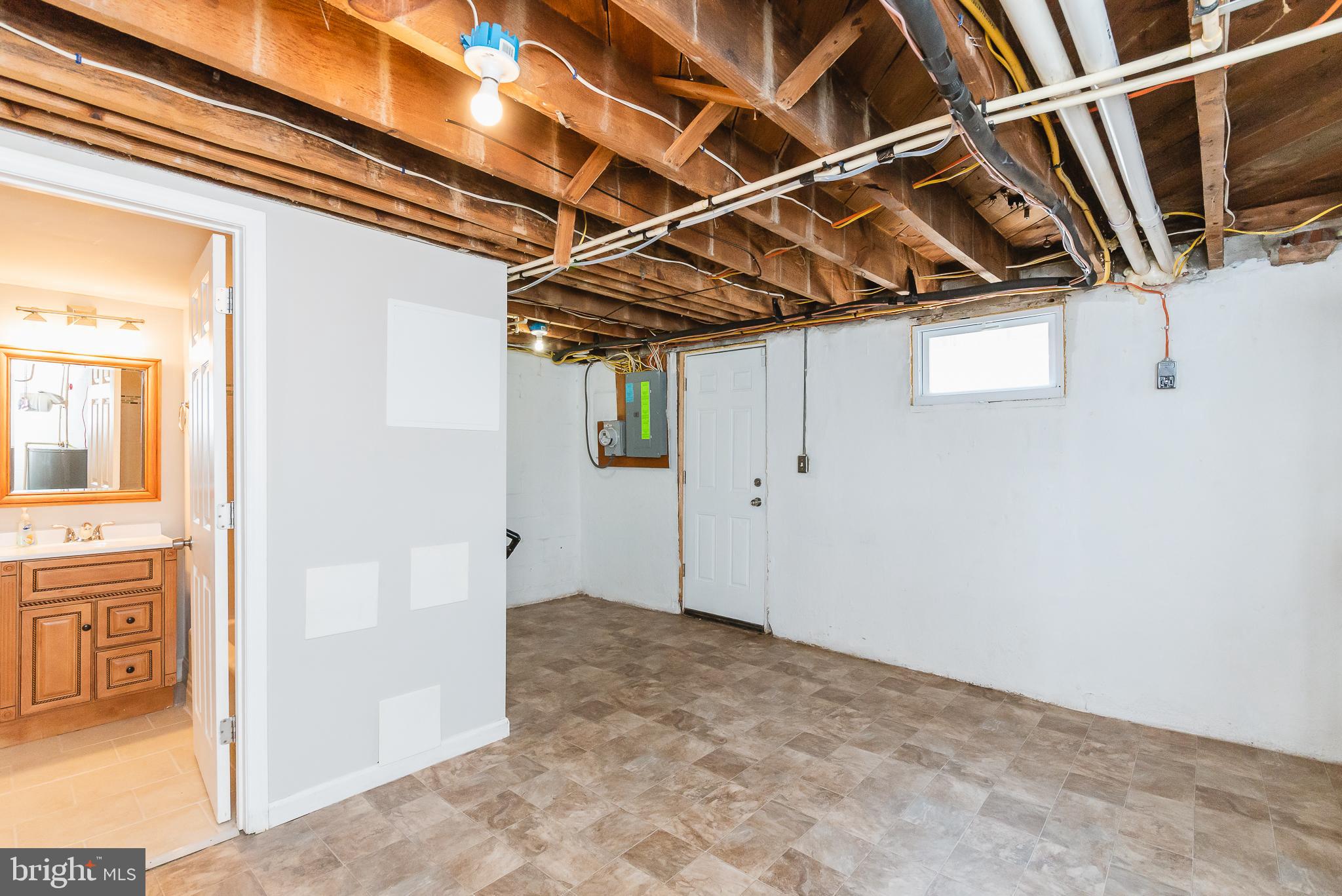 1811 Ramblewood Road Baltimore, MD 21239 - Photo 22 of 28 EXIT FROM LOWER LEVEL TO BACK YARD