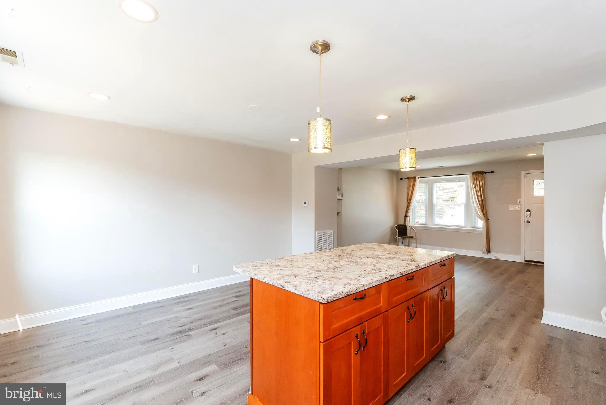 1811 Ramblewood Road Baltimore, MD 21239 - Photo 7 of 28 EXTRA CABINET SPACE IN ISLAND