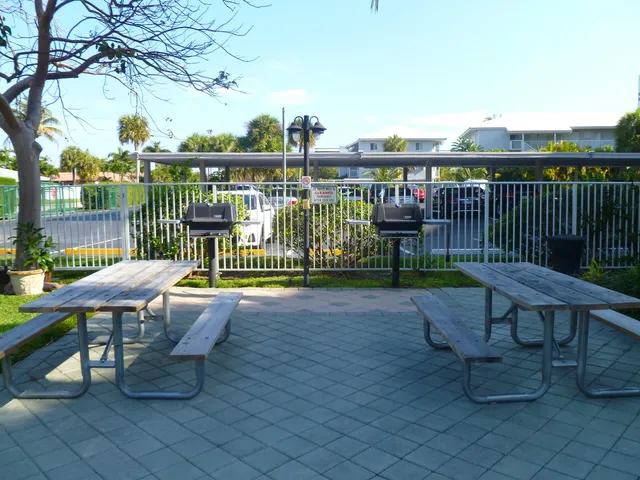 a view of a chairs and table in the deck