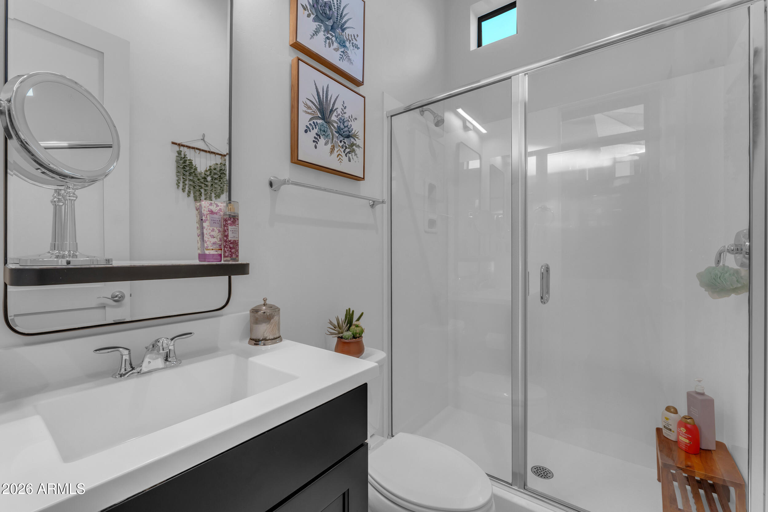 3908 East Alameda Lane Gilbert, AZ 85298 - Photo 9 of 62 a bathroom with a sink toilet and shower