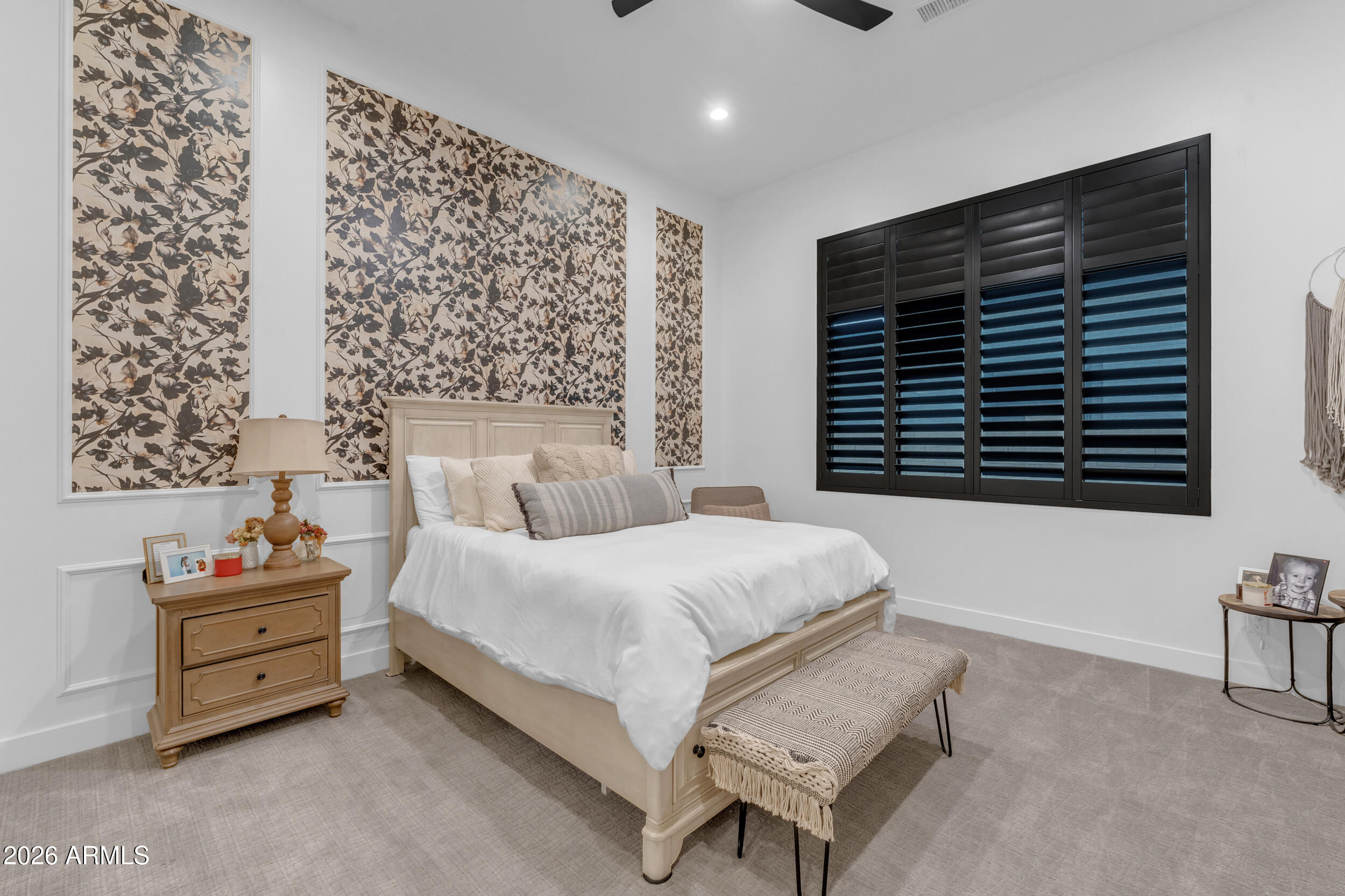 3908 East Alameda Lane Gilbert, AZ 85298 - Photo 13 of 62 a spacious bedroom with a bed and a chandelier