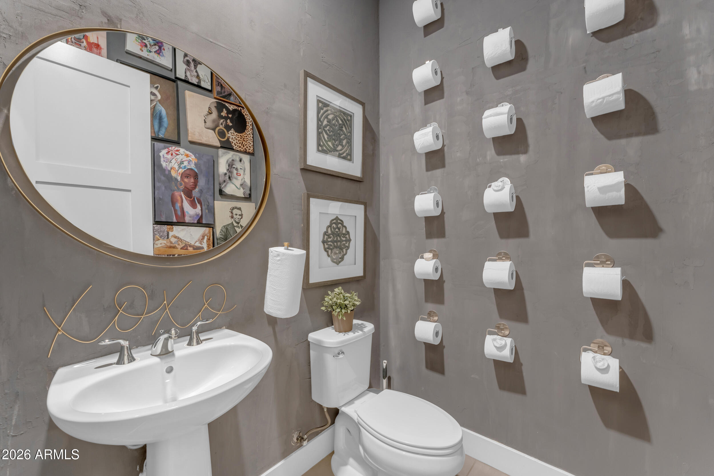 3908 East Alameda Lane Gilbert, AZ 85298 - Photo 16 of 62 a bathroom with a toilet a sink and a mirror