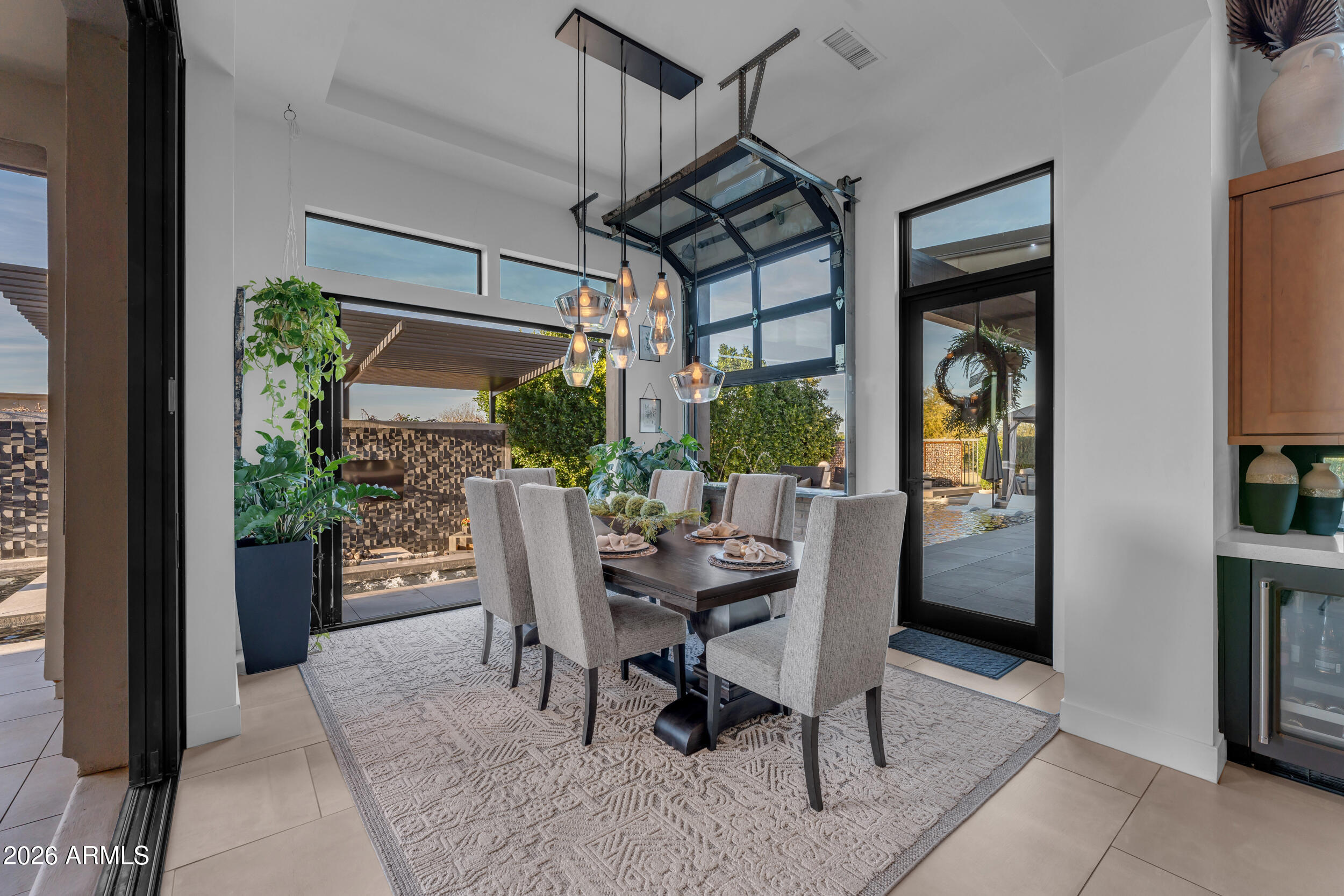 3908 East Alameda Lane Gilbert, AZ 85298 - Photo 24 of 62 a dining room with furniture window and outdoor view