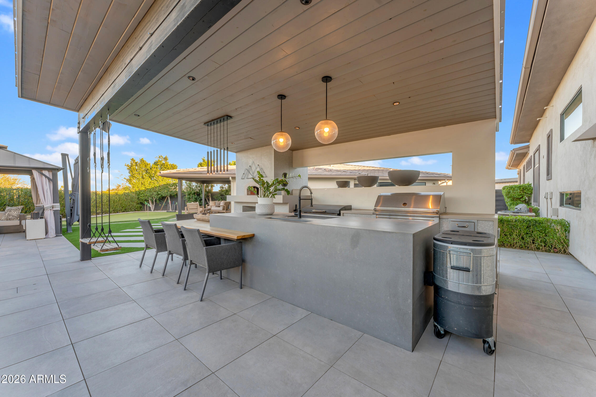 3908 East Alameda Lane Gilbert, AZ 85298 - Photo 37 of 62 a kitchen with a sink and a stove