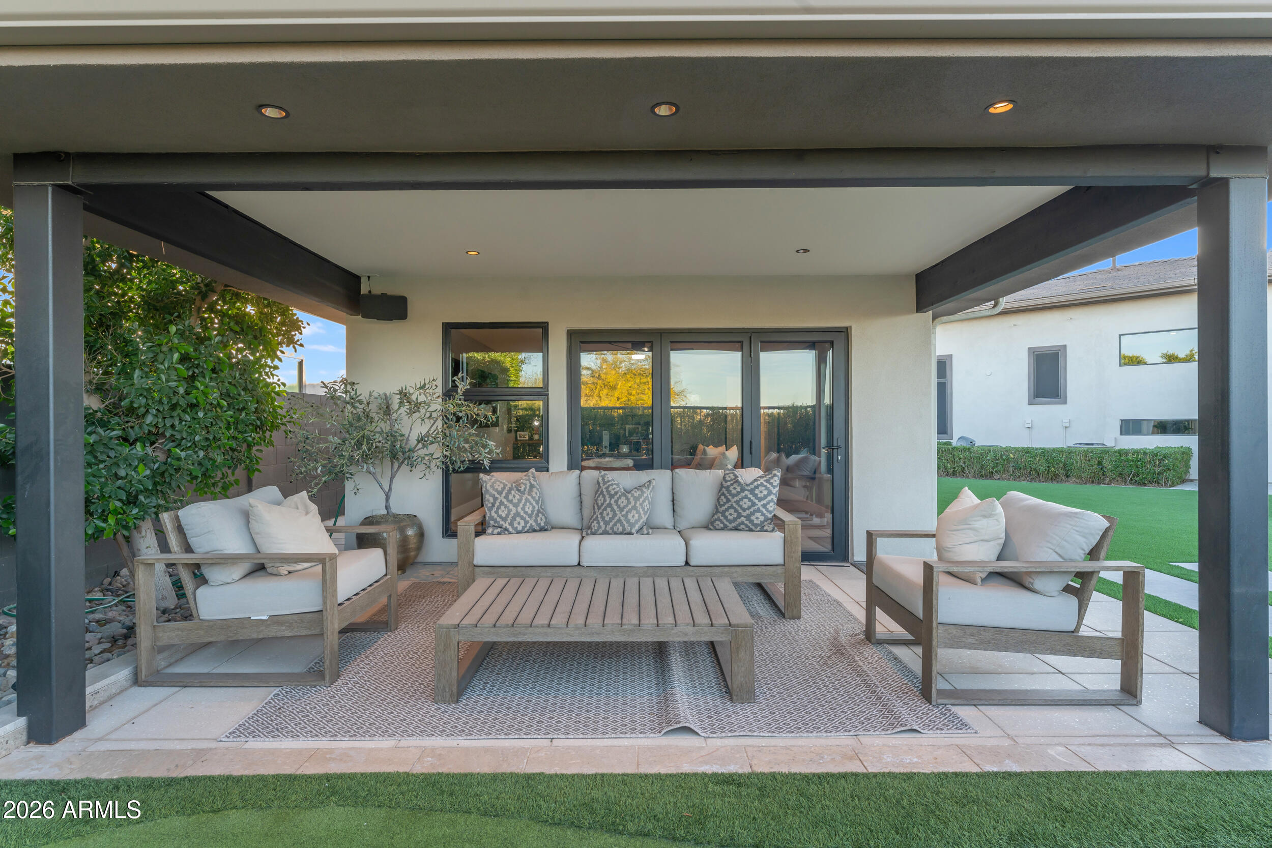 3908 East Alameda Lane Gilbert, AZ 85298 - Photo 42 of 62 a living room with furniture and a large window
