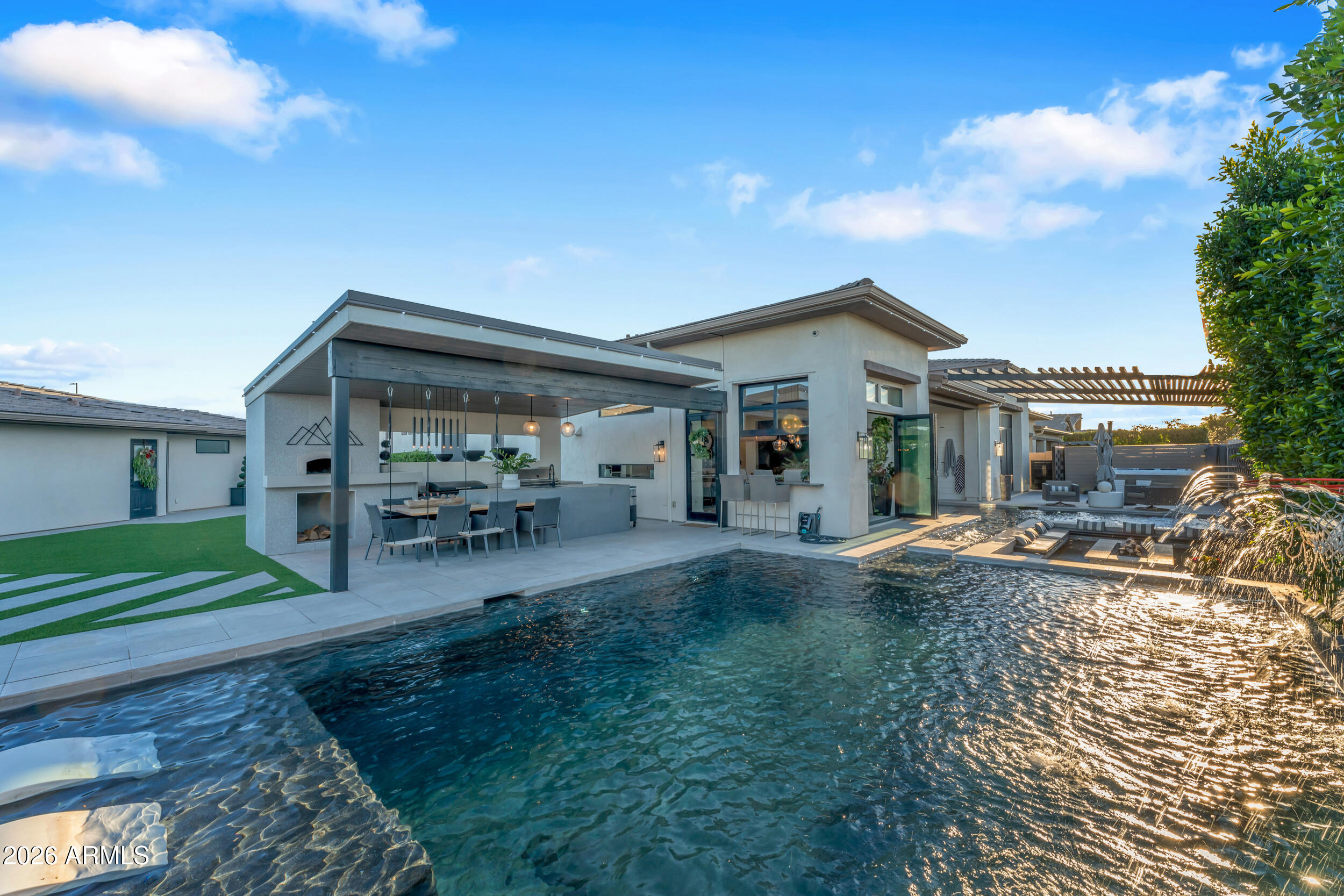 3908 East Alameda Lane Gilbert, AZ 85298 - Photo 46 of 62 a view of a house with backyard porch and sitting area