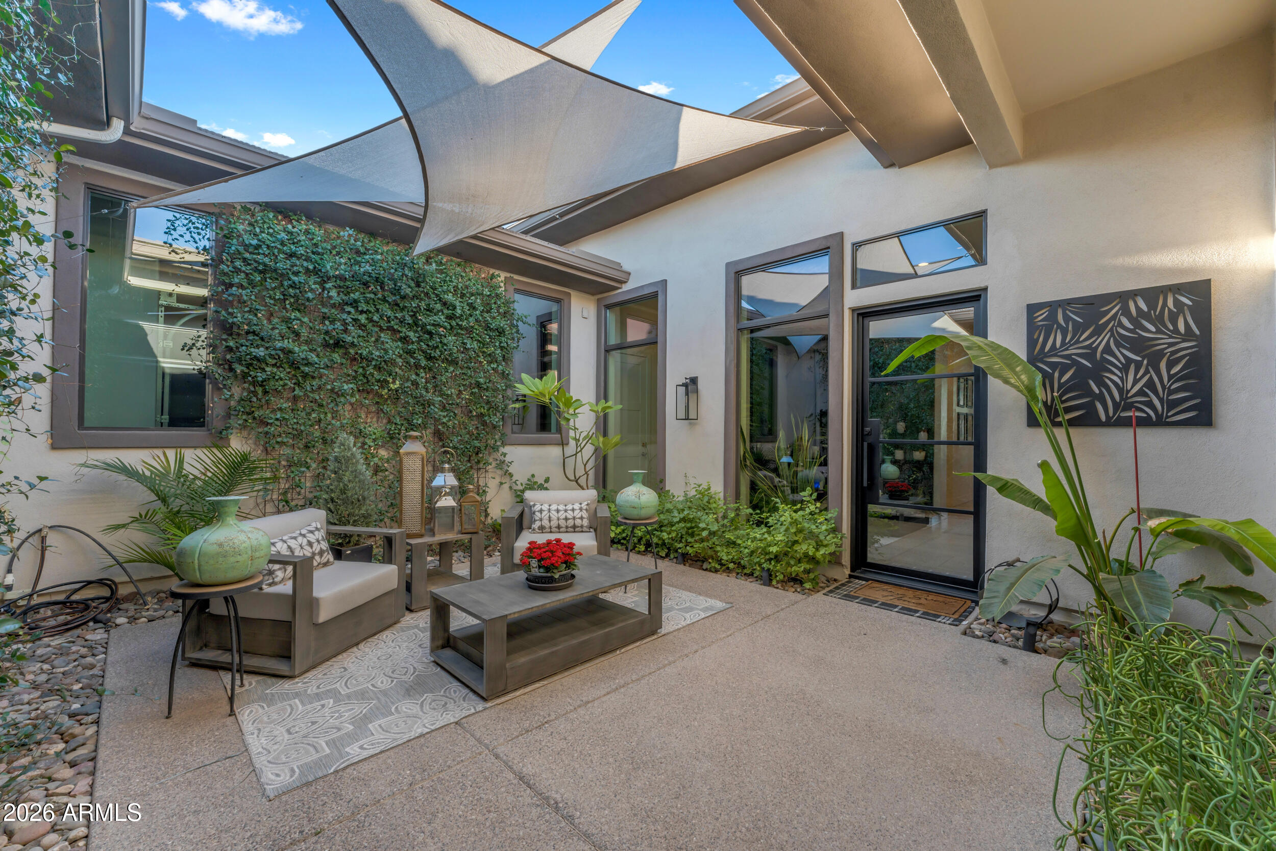 3908 East Alameda Lane Gilbert, AZ 85298 - Photo 4 of 62 a living room filled with furniture