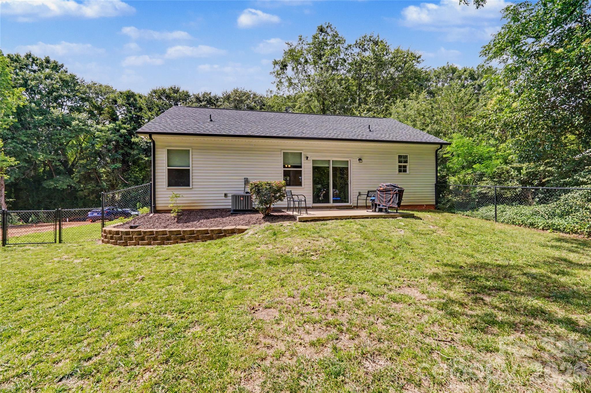 119 Brown Street Clover, SC 29710 - Photo 23 of 24 a view of a house with swimming pool and sitting area