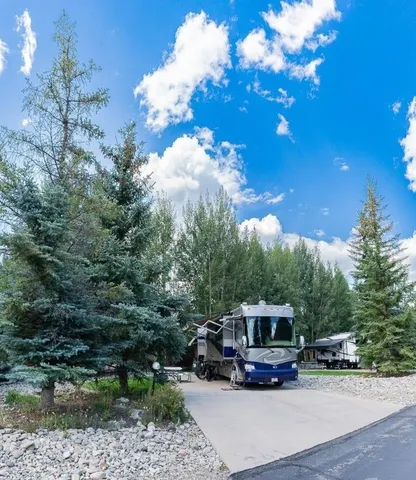 a view of the house with a yard