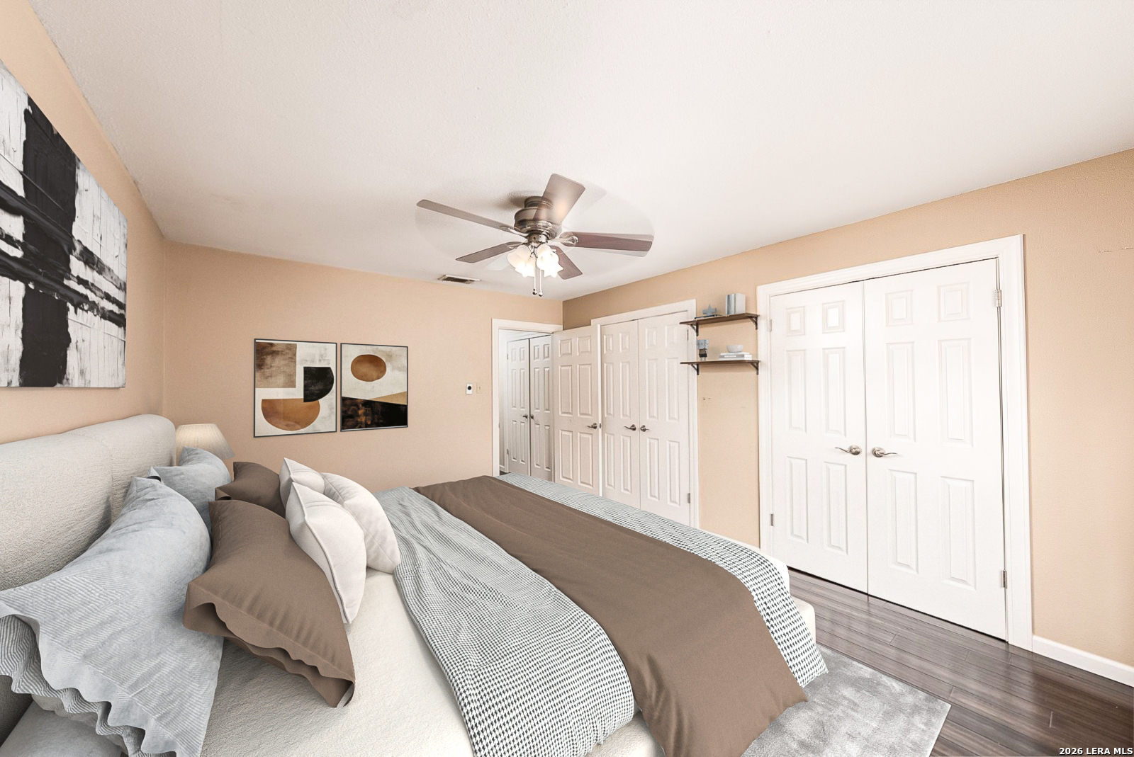 7711 Callaghan Road, Unit 805 San Antonio, TX 78229 - Photo 16 of 33 a bedroom with a bed and a chandelier