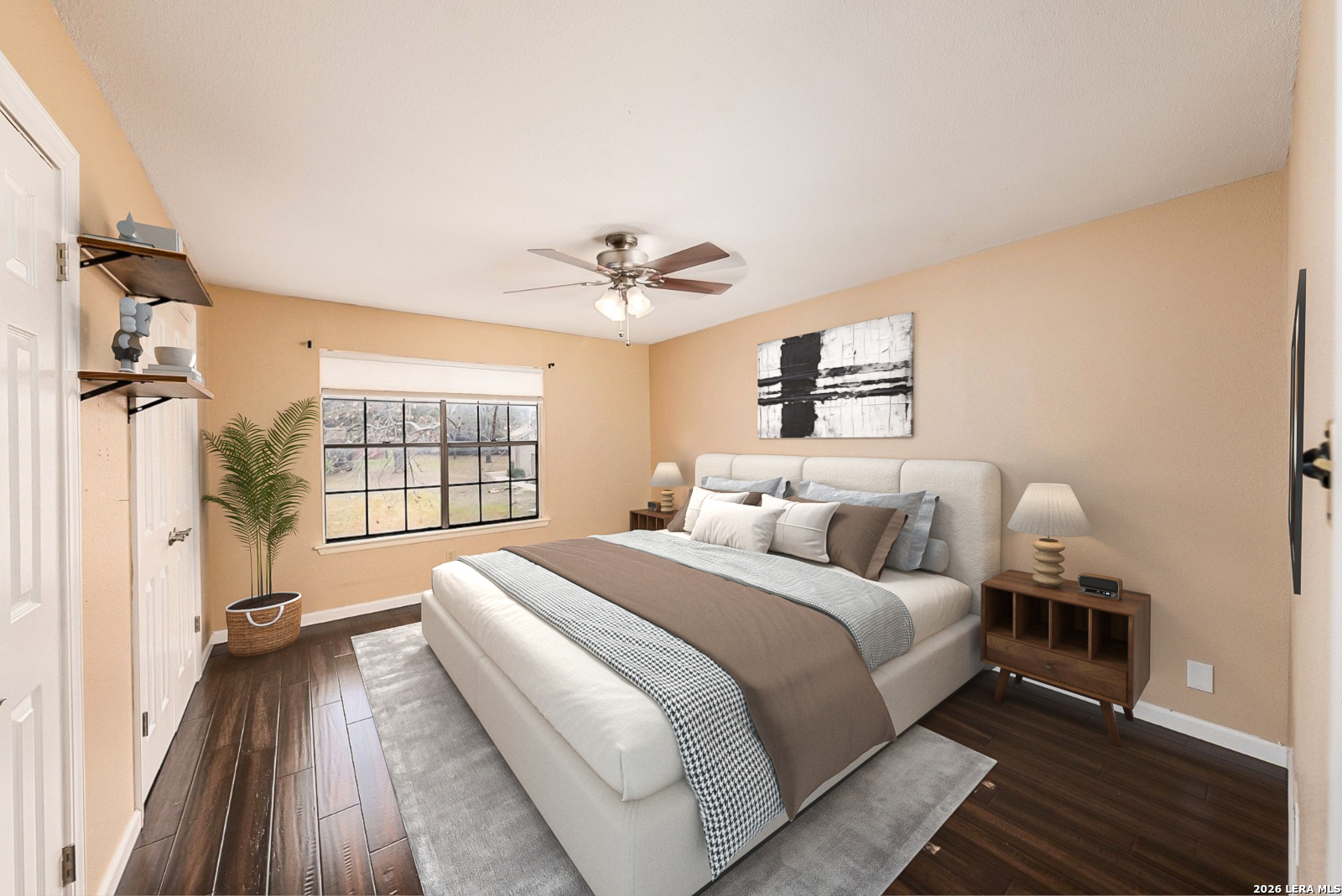 7711 Callaghan Road, Unit 805 San Antonio, TX 78229 - Photo 18 of 33 a bedroom with a bed and a large window with wooden floor