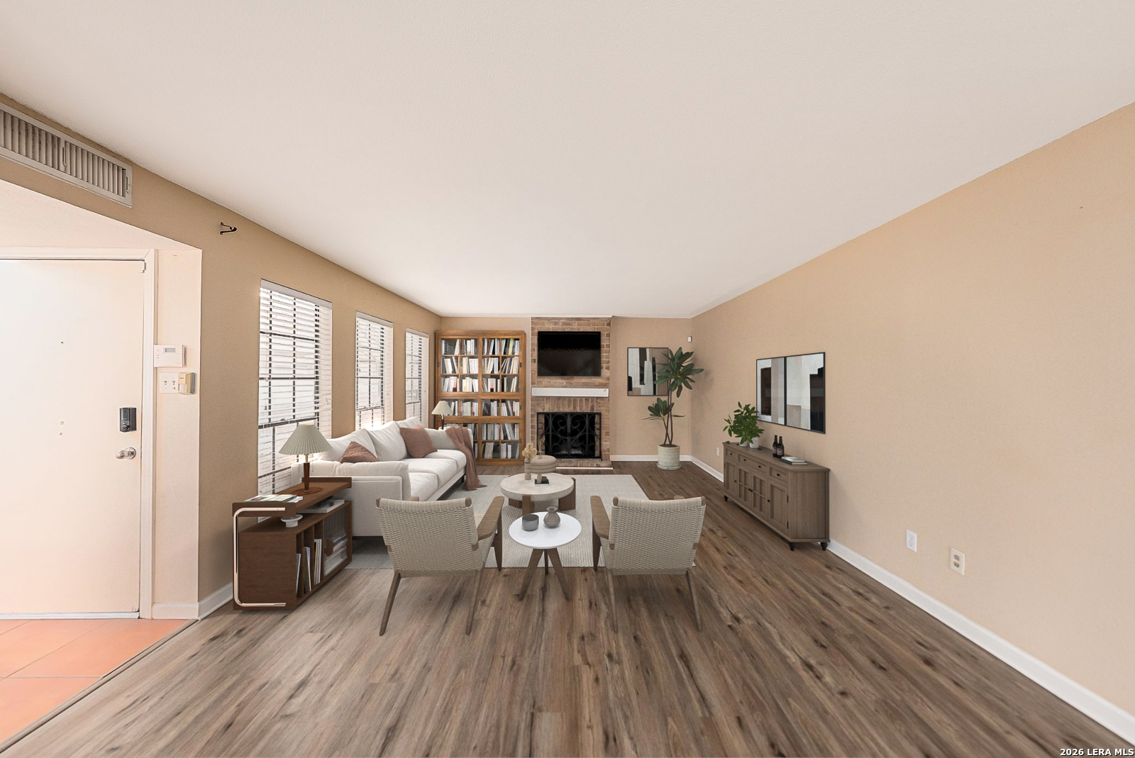 7711 Callaghan Road, Unit 805 San Antonio, TX 78229 - Photo 6 of 33 a living room with furniture large window and wooden floor