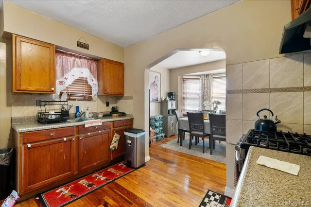 a very nice looking kitchen with a large window