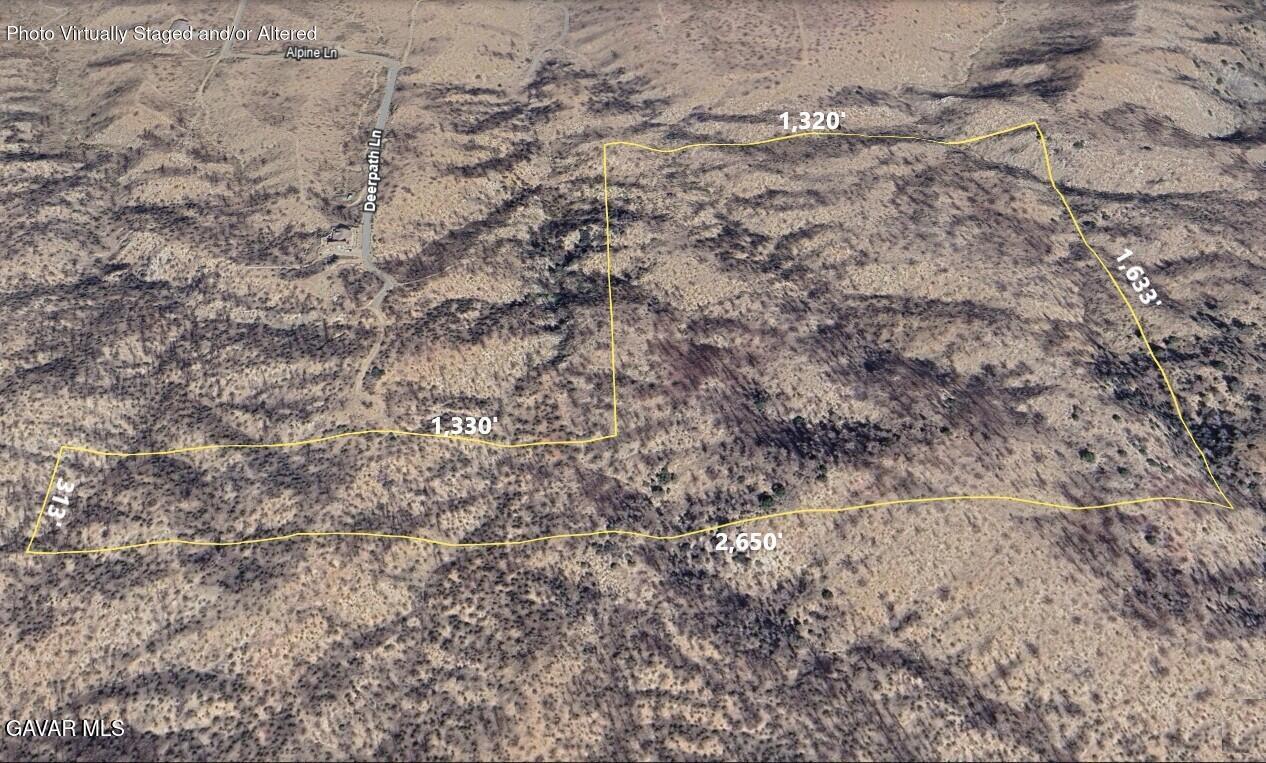 Deerpath Lane Llano, CA 93544 - Photo 2 of 8 a view of a yard