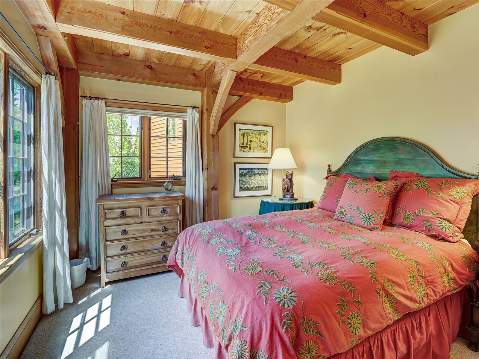 840 Penstemon Road Keystone, CO 80435 - Photo 22 of 50 Carpeted bedroom featuring a wooden ceiling with exposed beams and multiple windows