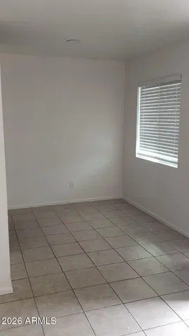 a view of a room that has a window in it