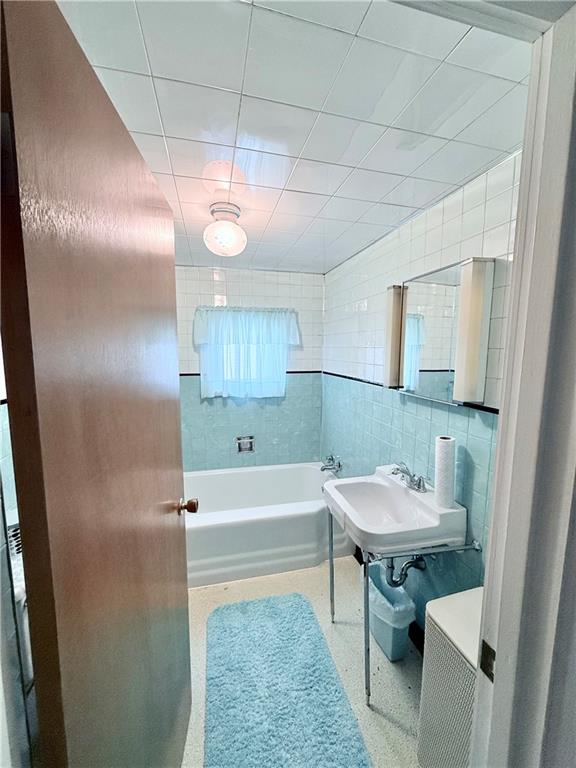 9 Kennedy Street Republic, PA 15475 - Photo 20 of 24 a bathroom with a sink a toilet and bathtub