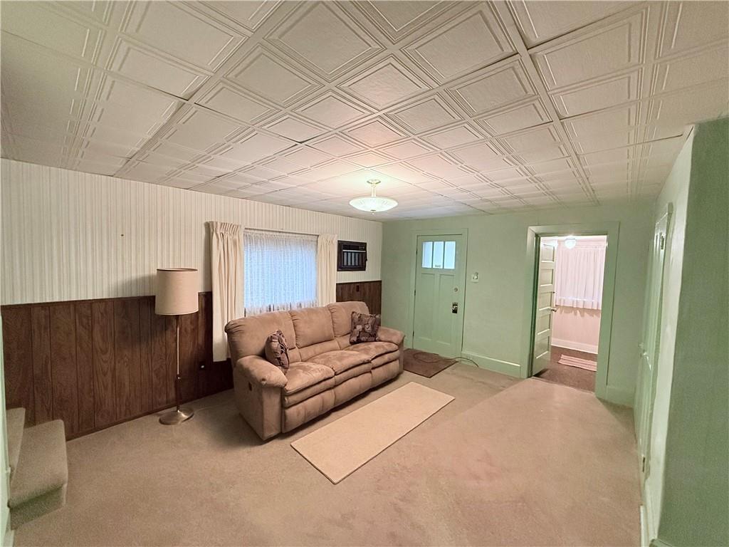 9 Kennedy Street Republic, PA 15475 - Photo 9 of 24 a spacious bedroom with a bed and a couch