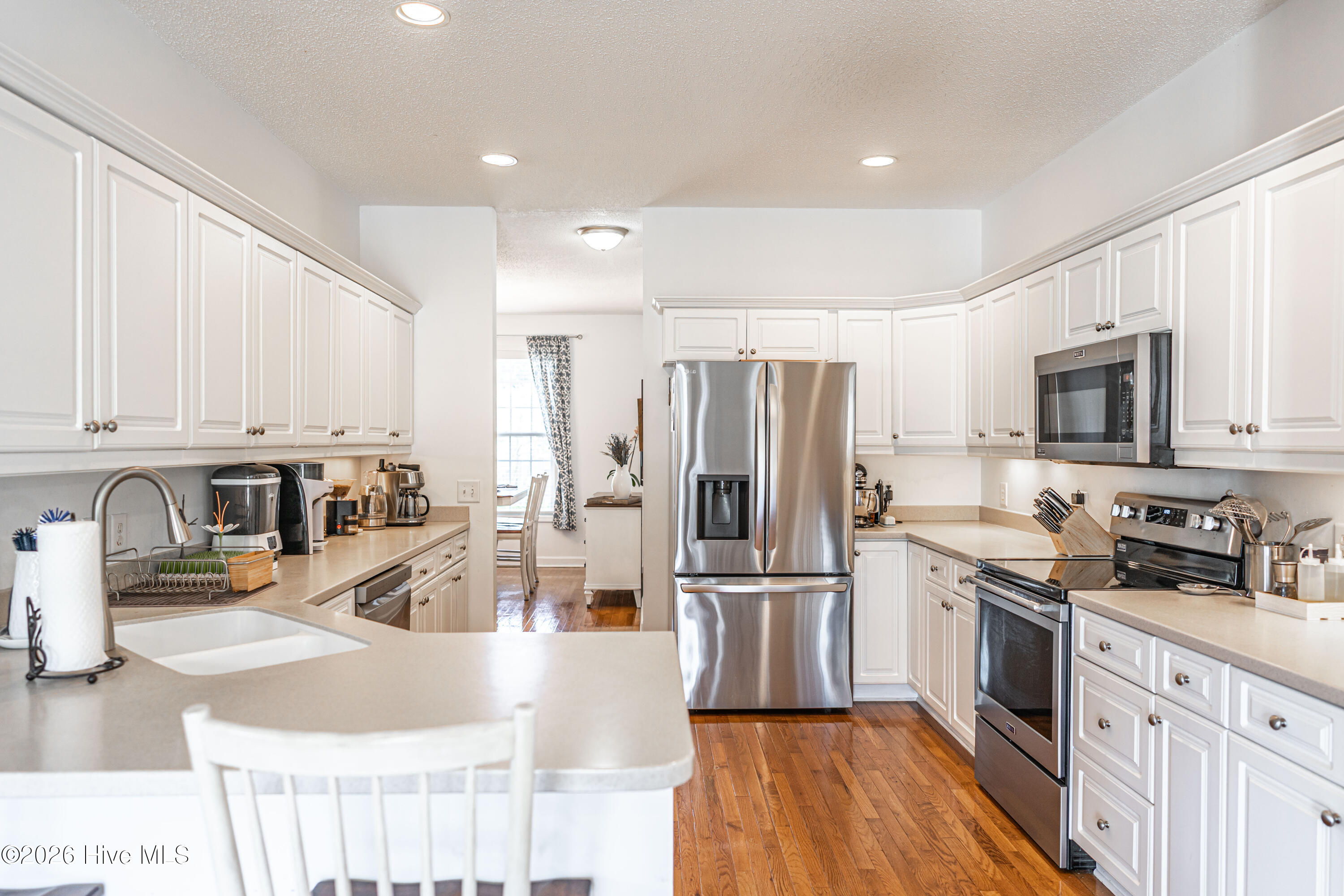 1320 Burning Tree Road Pinehurst, NC 28374 - Photo 9 of 60 Light and neutral tone kitchen
