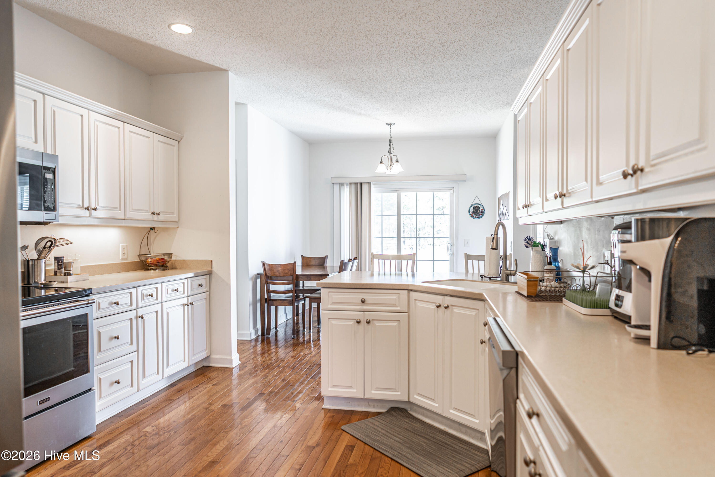 1320 Burning Tree Road Pinehurst, NC 28374 - Photo 14 of 60 Kitchen opens to breakfast nook
