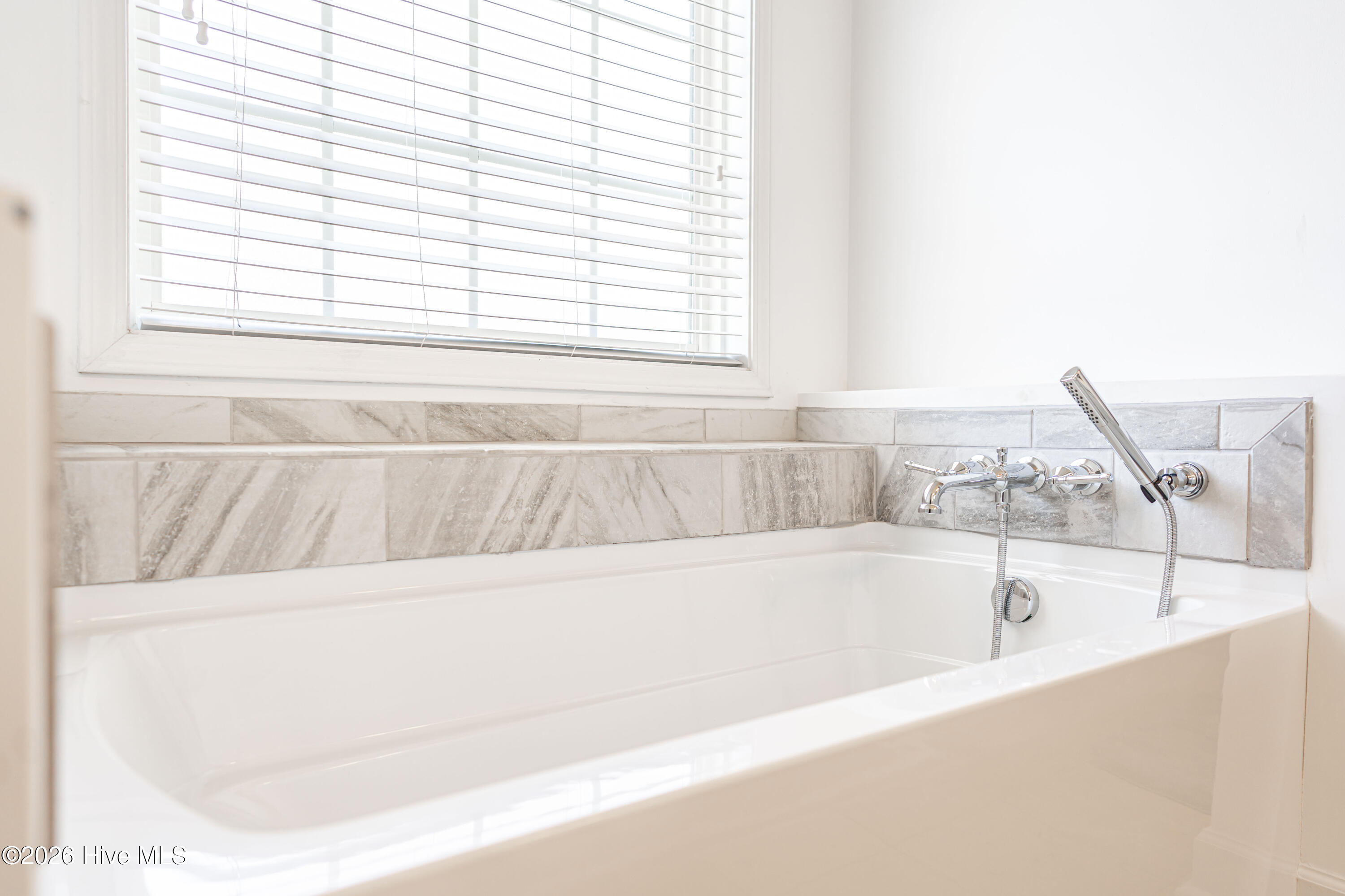 1320 Burning Tree Road Pinehurst, NC 28374 - Photo 32 of 60 Jetted tub with tile surround