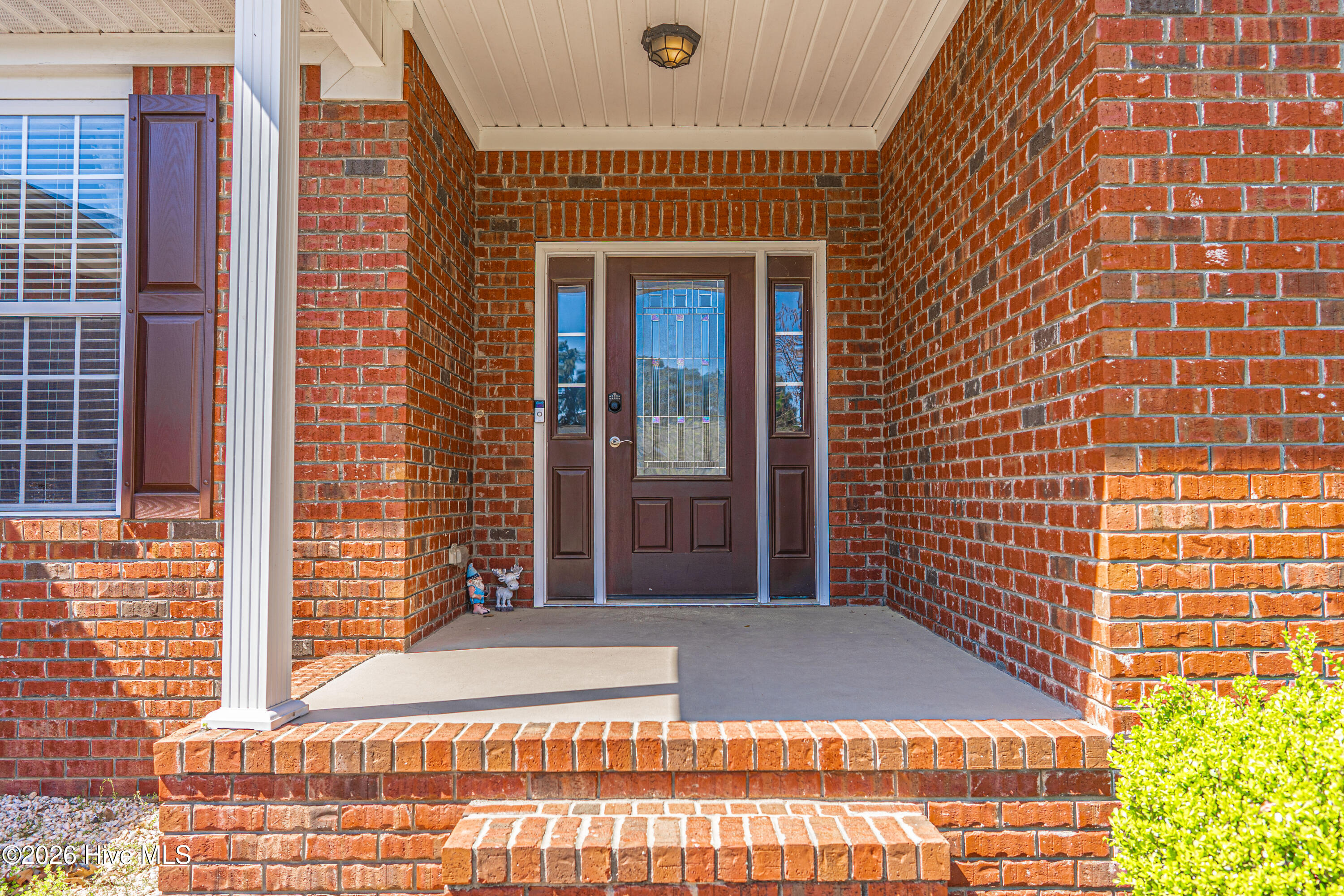1320 Burning Tree Road Pinehurst, NC 28374 - Photo 4 of 60 Covered front porch entrance