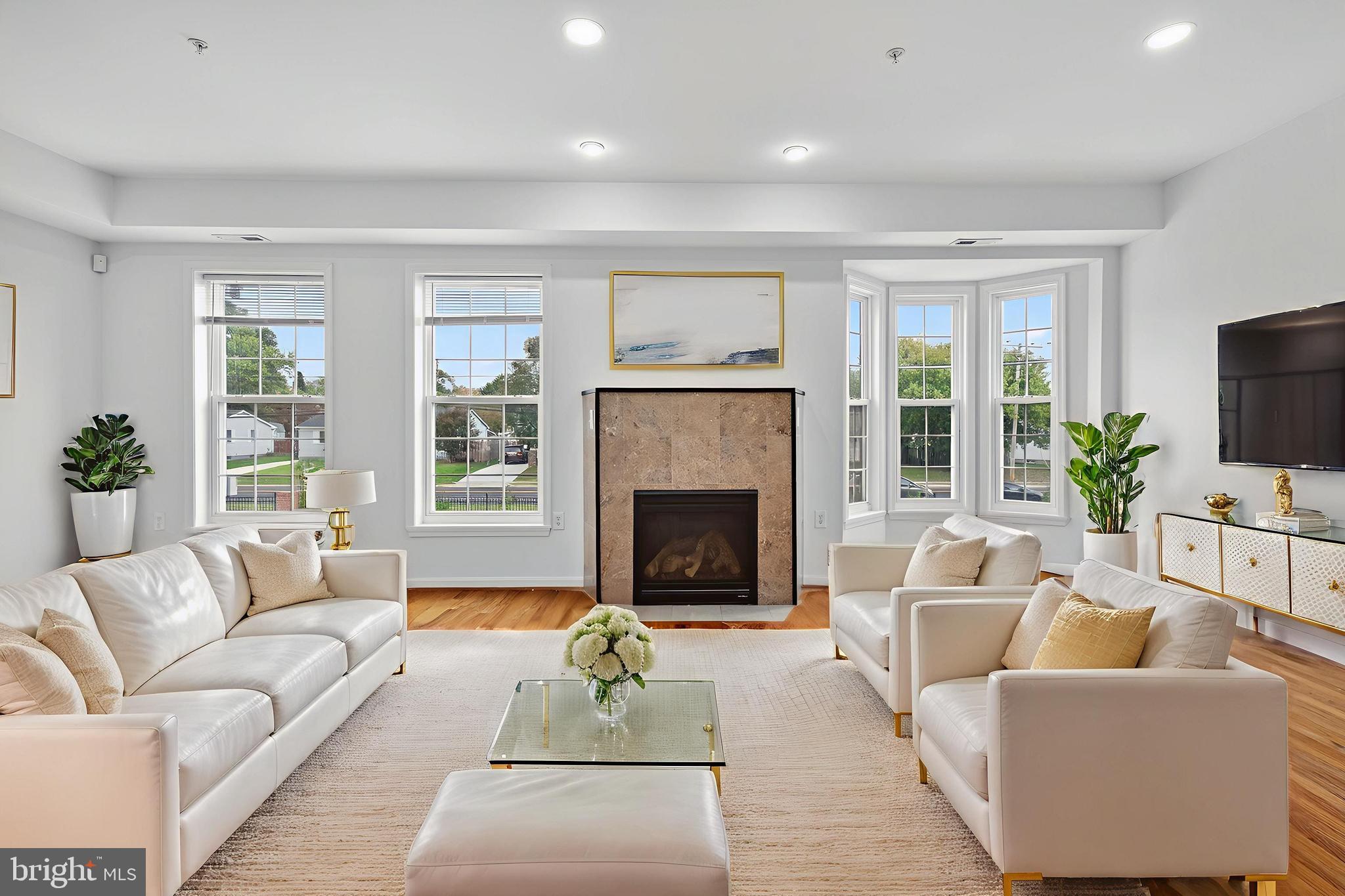 266 Brock Bridge Road Laurel, MD 20724 - Photo 6 of 21 LivingRoom w Fireplace & Hardwoods + high ceilings