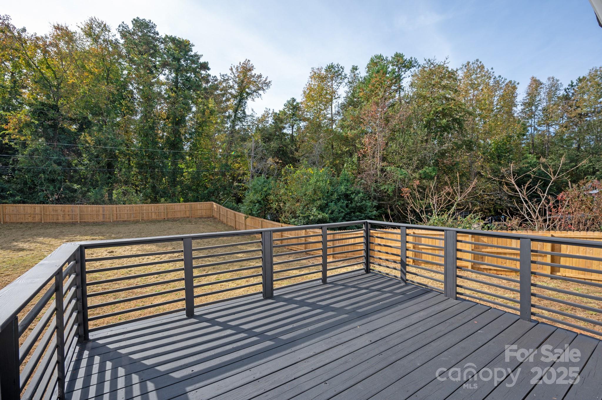 9000 Boyd Drive Matthews, NC 28105 - Photo 27 of 30 a view of a balcony with wooden floor and fence