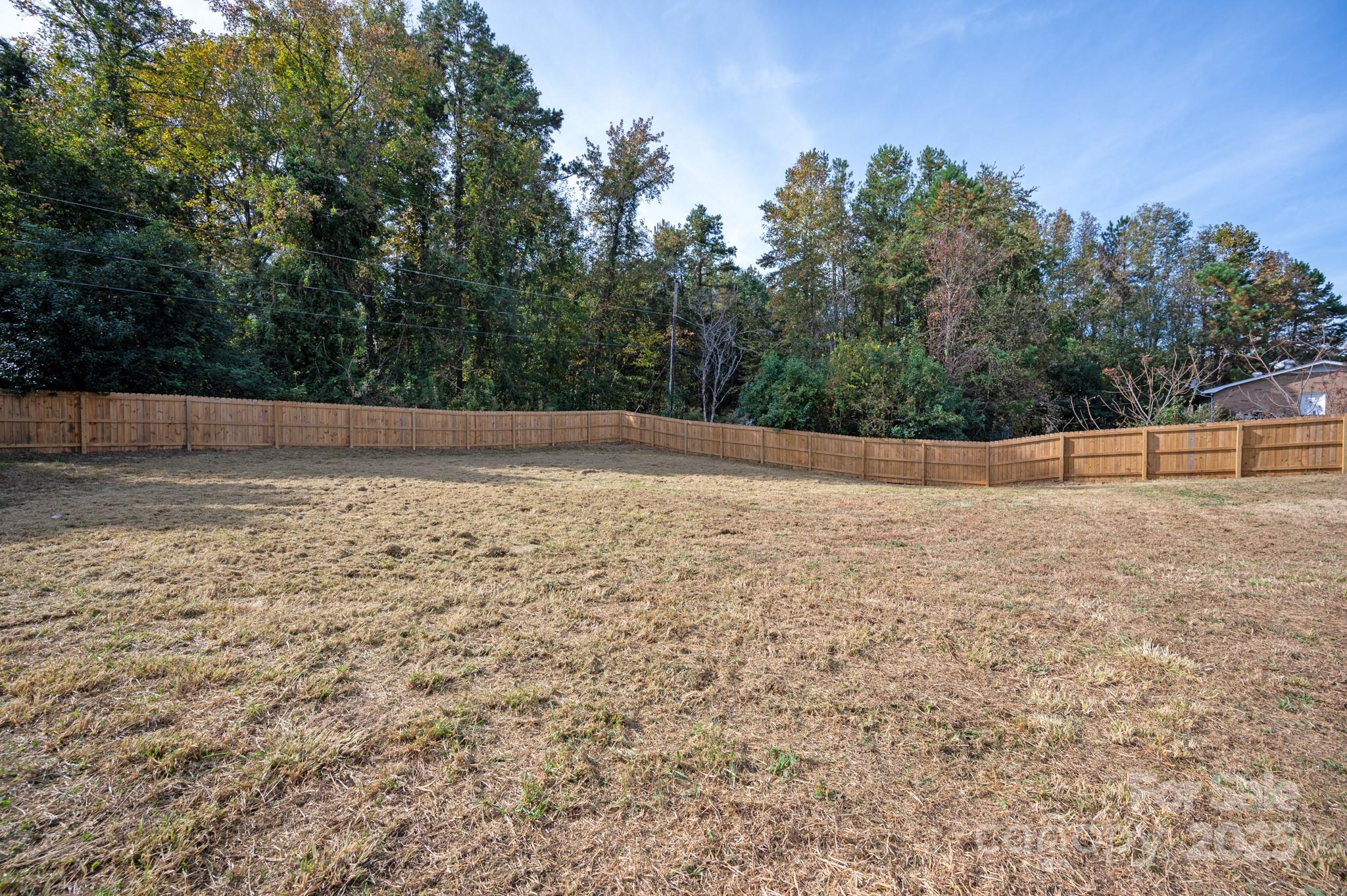 9000 Boyd Drive Matthews, NC 28105 - Photo 28 of 30 a view of empty room with trees
