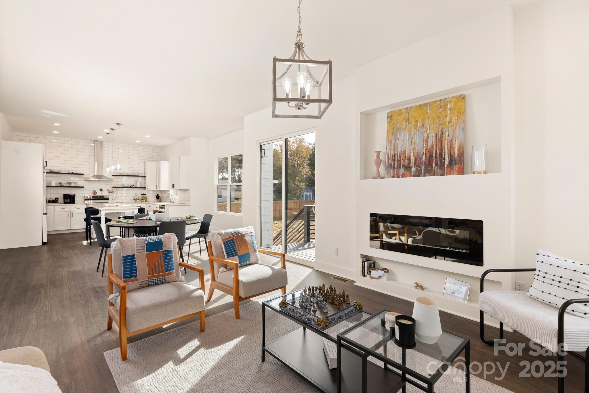 9000 Boyd Drive Matthews, NC 28105 - Photo 6 of 30 a living room with furniture and a fireplace