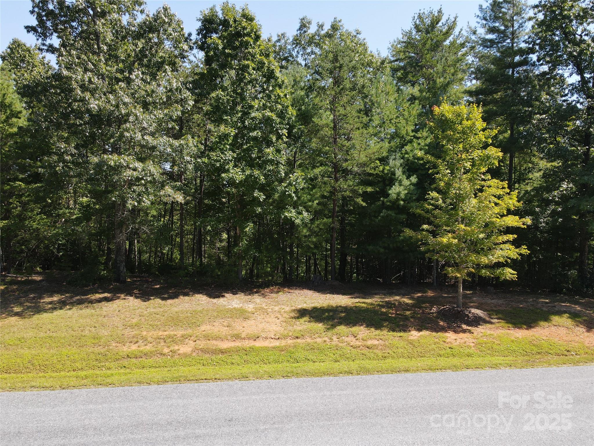 178 Beacon Ridge Drive Nebo, NC 28761 - Photo 11 of 20 a view of swimming pool with an outdoor space and seating area