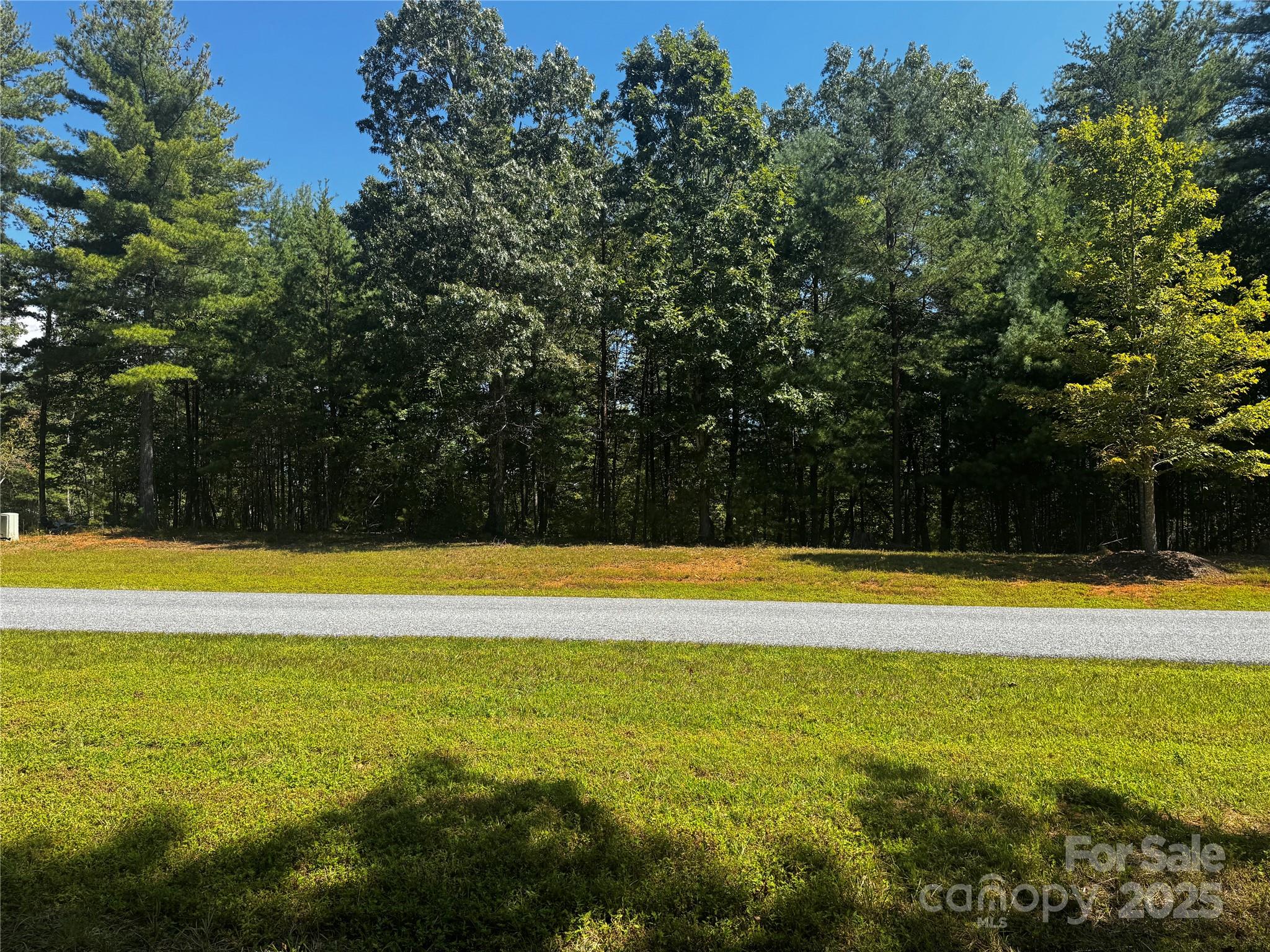 178 Beacon Ridge Drive Nebo, NC 28761 - Photo 9 of 20 a view of a swimming pool with an outdoor space and seating area