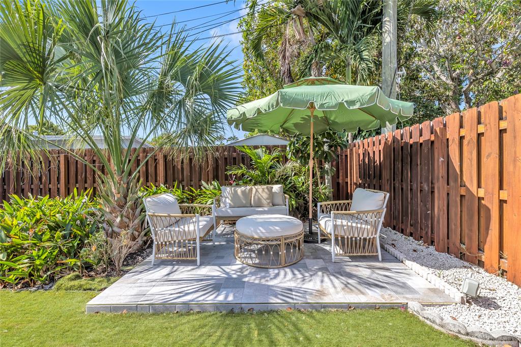 2412 Northeast 4th Street, Unit W Pompano Beach, FL 33062 - Photo 25 of 25 a view of a outdoor sitting area with furniture