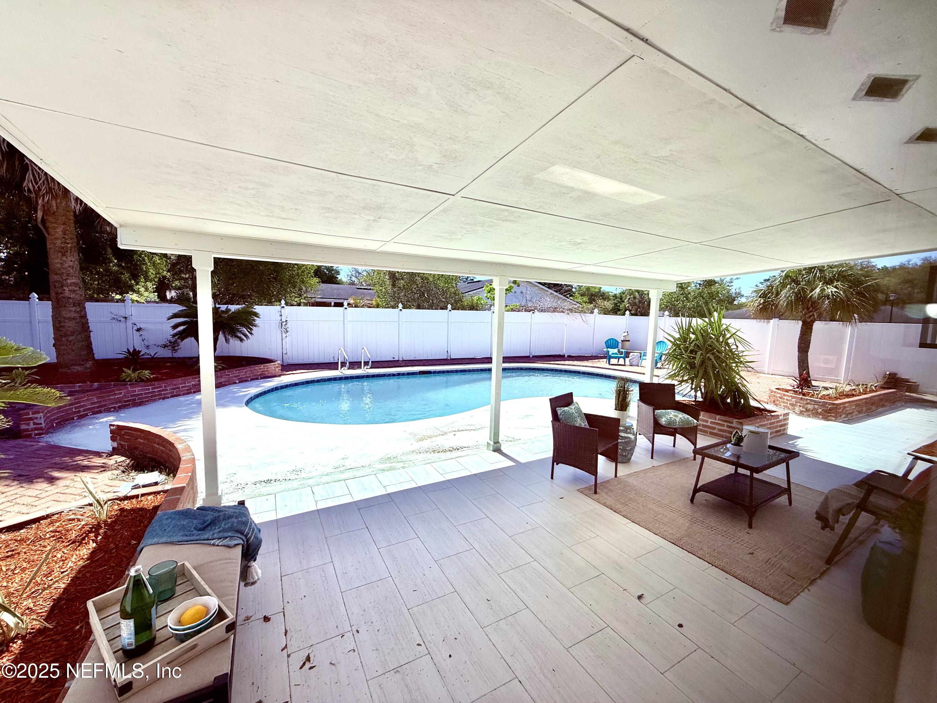 3951 Raintree Road Jacksonville, FL 32277 - Photo 15 of 18 Covered patio and pool