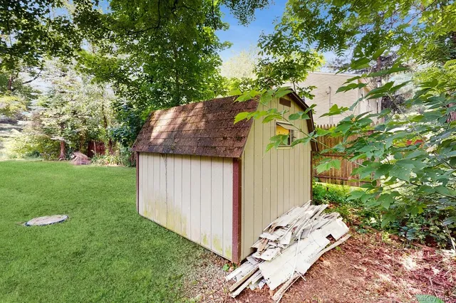 a view of backyard with green space