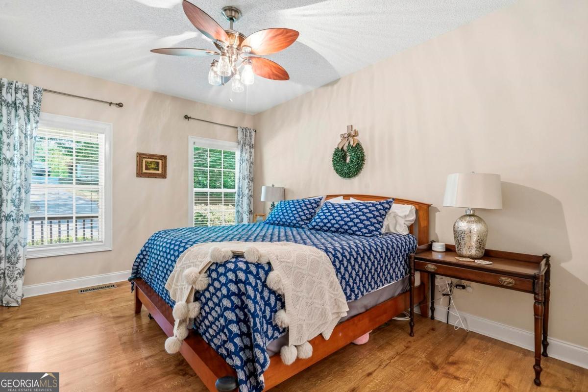 172 Mays Road Milledgeville, GA 31061 - Photo 24 of 54 a bedroom with a bed and a window