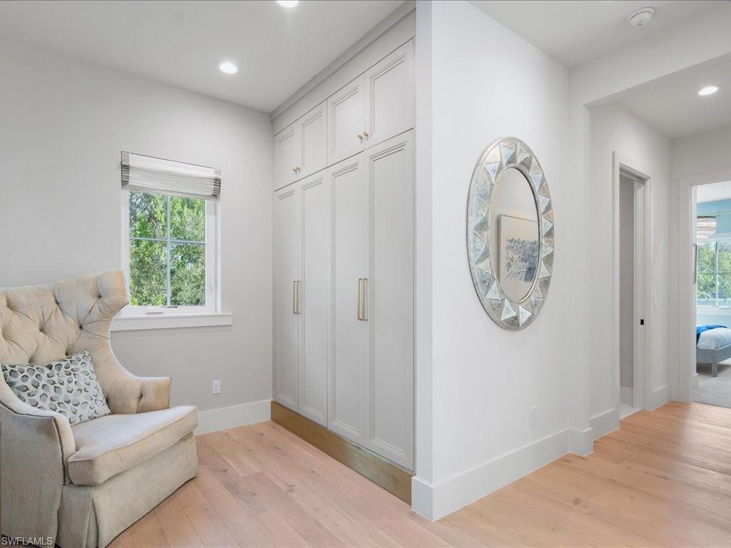 9185 Mercato Way Naples, FL 34108 - Photo 33 of 50 a living room with furniture and a window