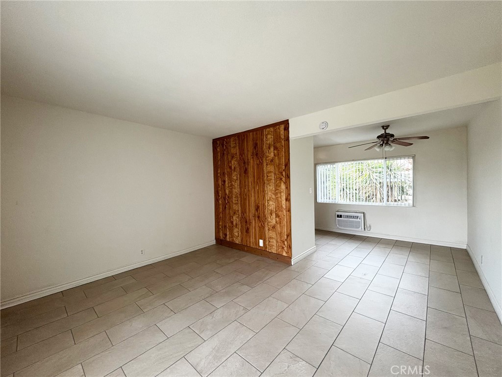 701 Adlena Drive, Unit 4 Fullerton, CA 92833 - Photo 6 of 14 an empty room with windows