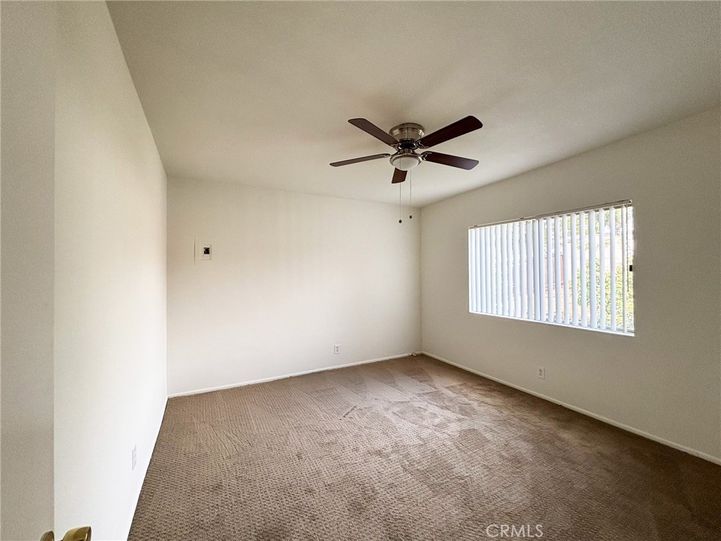 701 Adlena Drive, Unit 4 Fullerton, CA 92833 - Photo 10 of 14 an empty room with a window