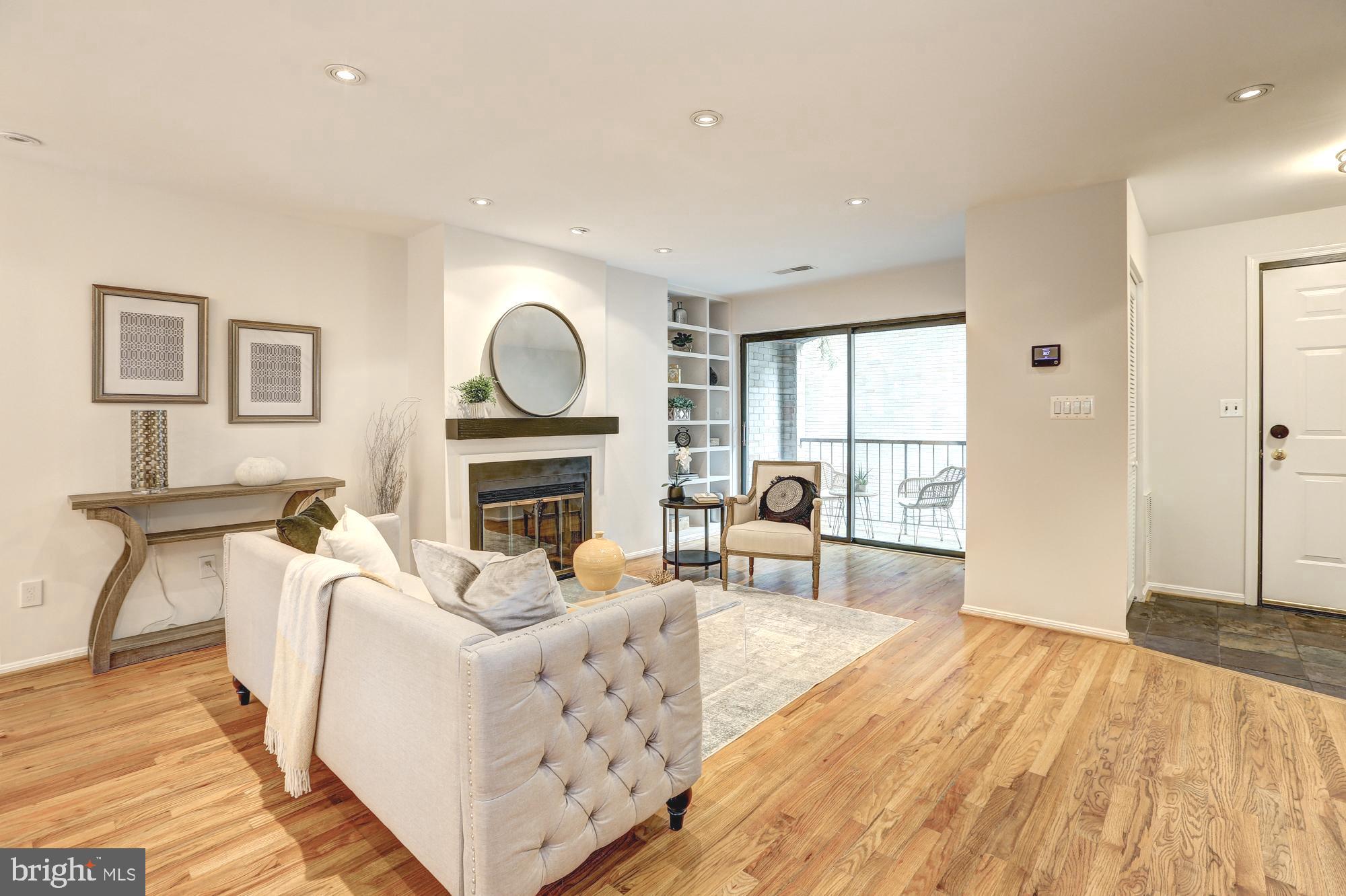 1325 13th Street Northwest, Unit 29 Washington, DC 20005 - Photo 3 of 48 Wood-burning fireplace and gorgeous built-ins
