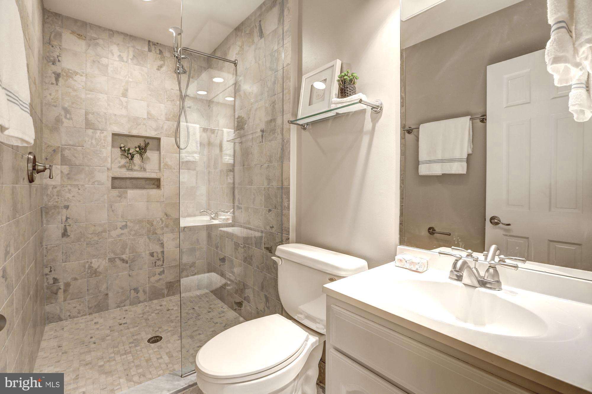 1325 13th Street Northwest, Unit 29 Washington, DC 20005 - Photo 26 of 48 Large walk-in shower in primary bathroom