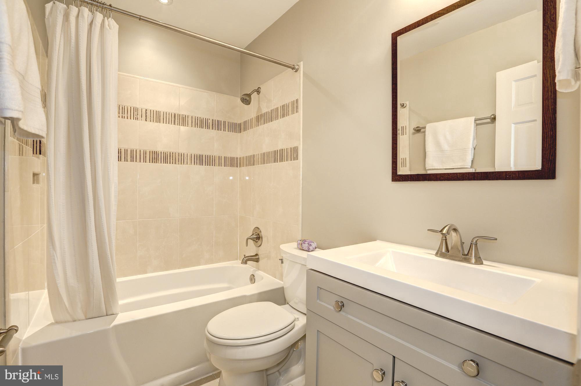1325 13th Street Northwest, Unit 29 Washington, DC 20005 - Photo 30 of 48 Second floor hallway bathroom
