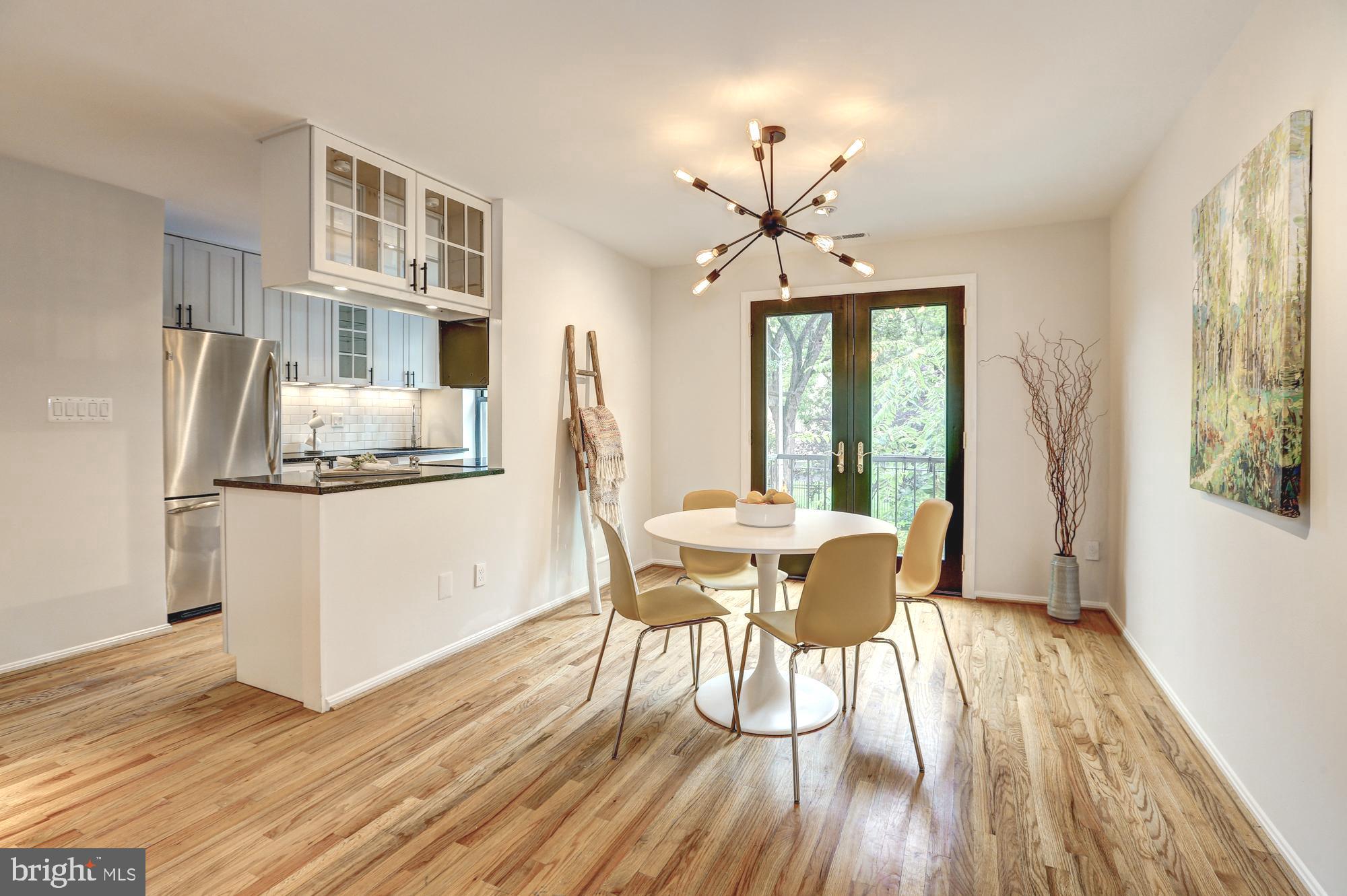 1325 13th Street Northwest, Unit 29 Washington, DC 20005 - Photo 4 of 48 Spacious dining area and open kitchen