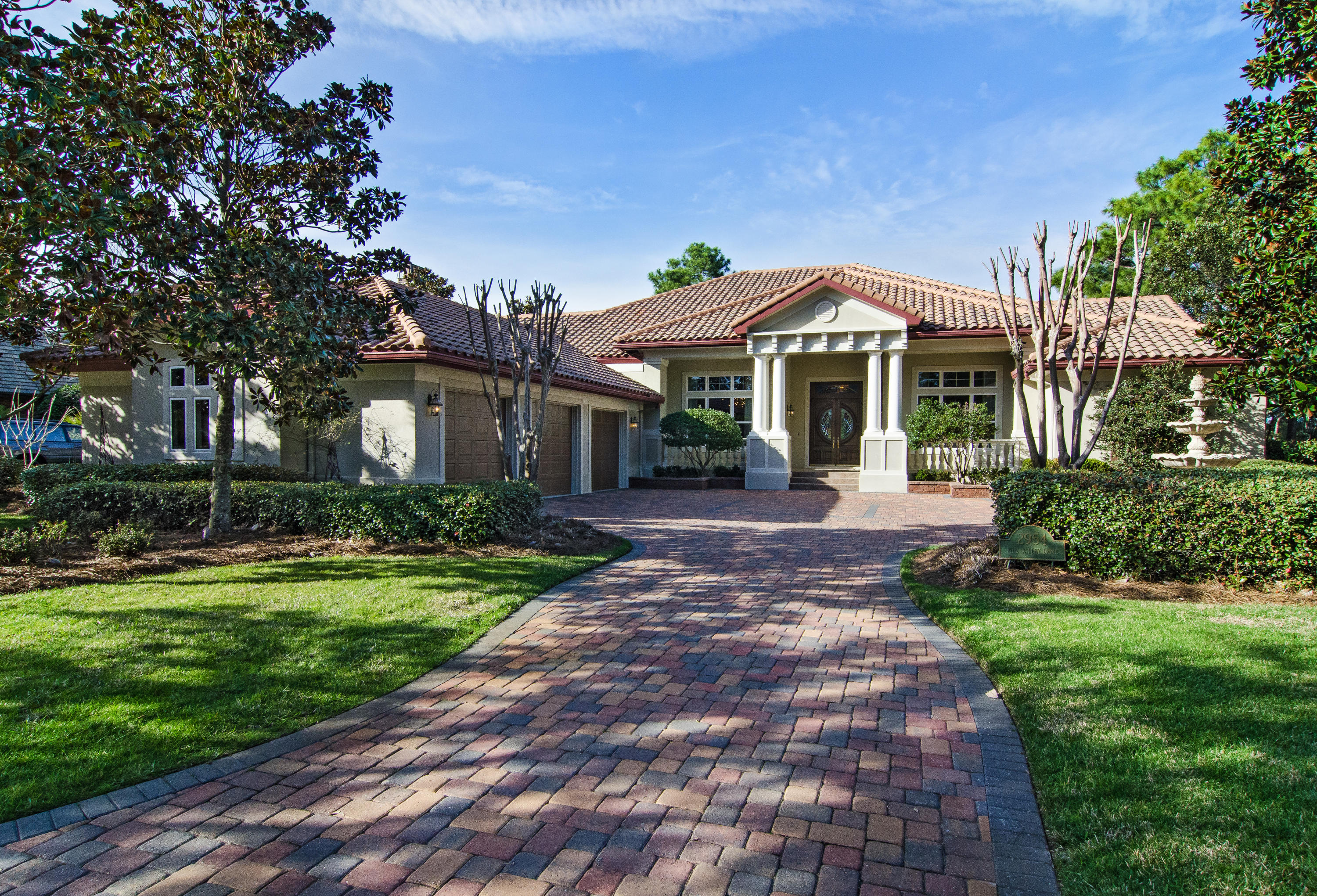 2954 Pine Valley Road Miramar Beach, FL 32550 - Photo 1 of 54 a front view of a house with a yard